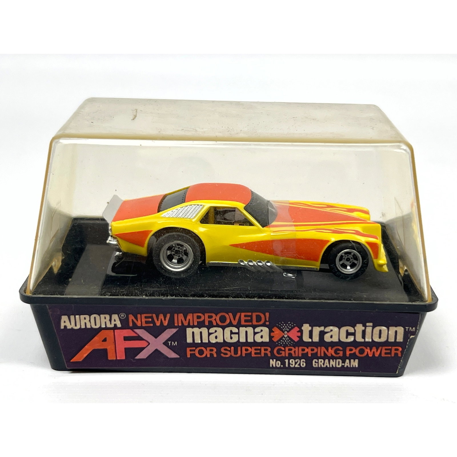 Aurora AFX Magna-Traction HO scale slot car, Model No. 1926 Grand-Am. The vehicle features a molded (1 of 6)