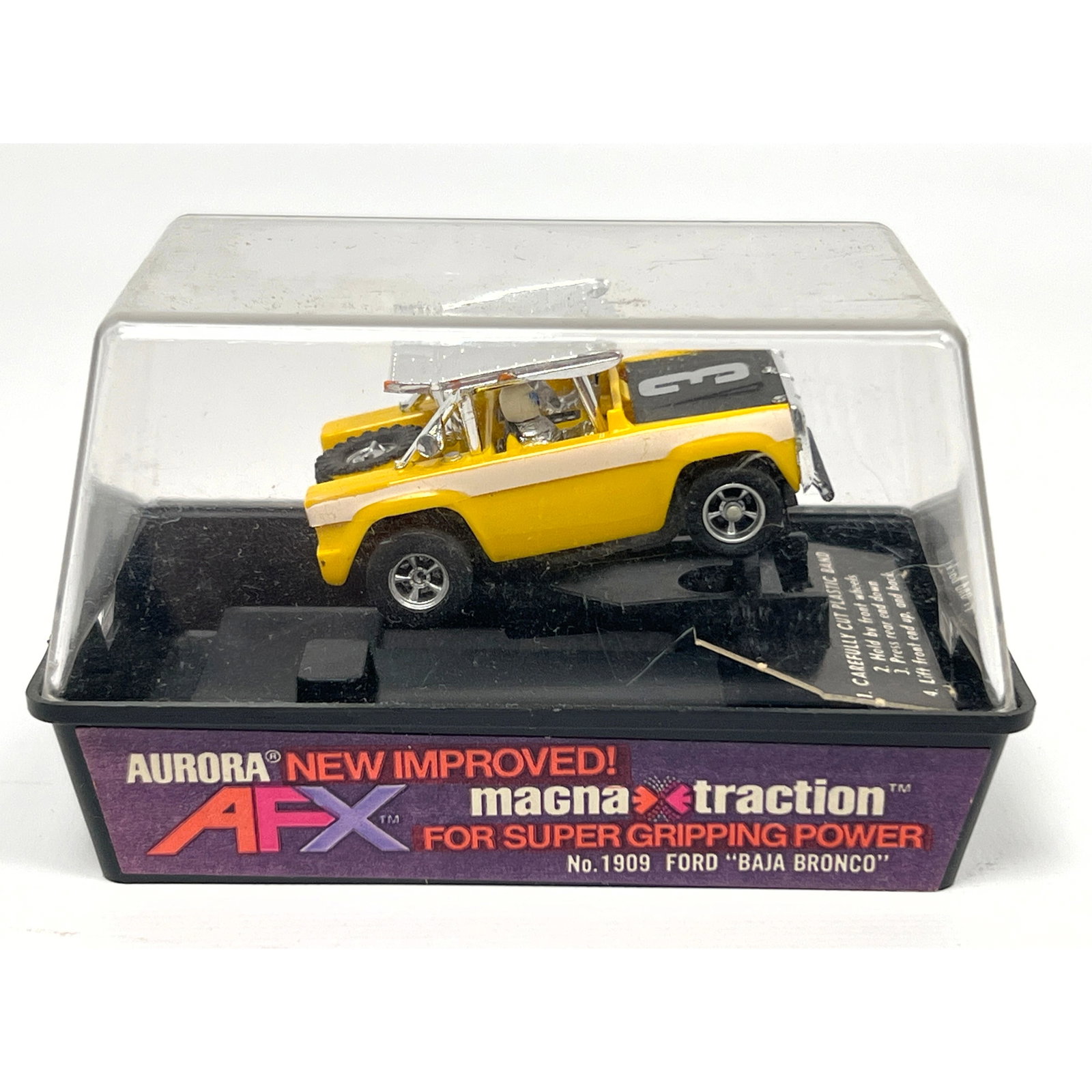 HO-scale electric slot car is manufactured by Aurora as part of the AFX line. The model is a Ford Ba (1 of 10)