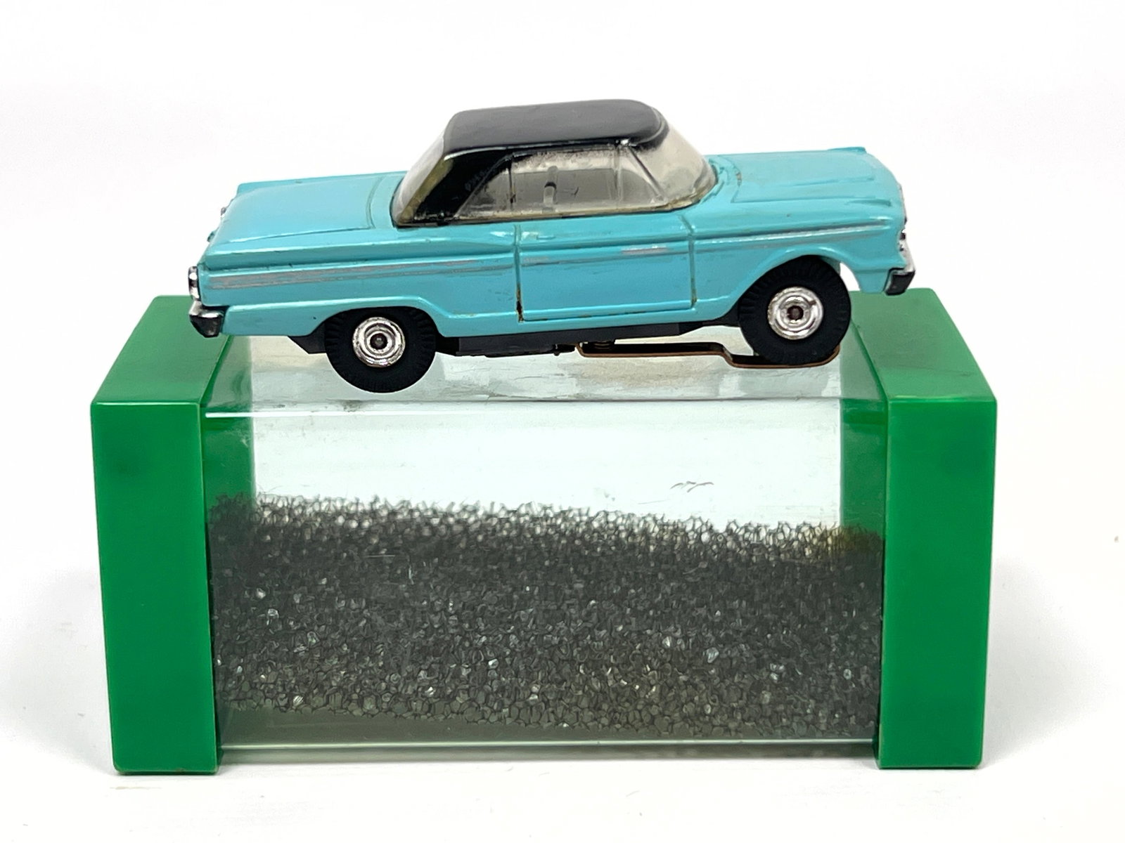 2 HO scale electric slot cars manufactured by Aurora for the Model Motoring line, utilizing the Thun: 2 HO scale electric slot cars manufactured by Aurora for the Model Motoring line, utilizing the Thunder Jet chassis system. The collection includes a 1963 Mercury Monterey finished in light blue with 