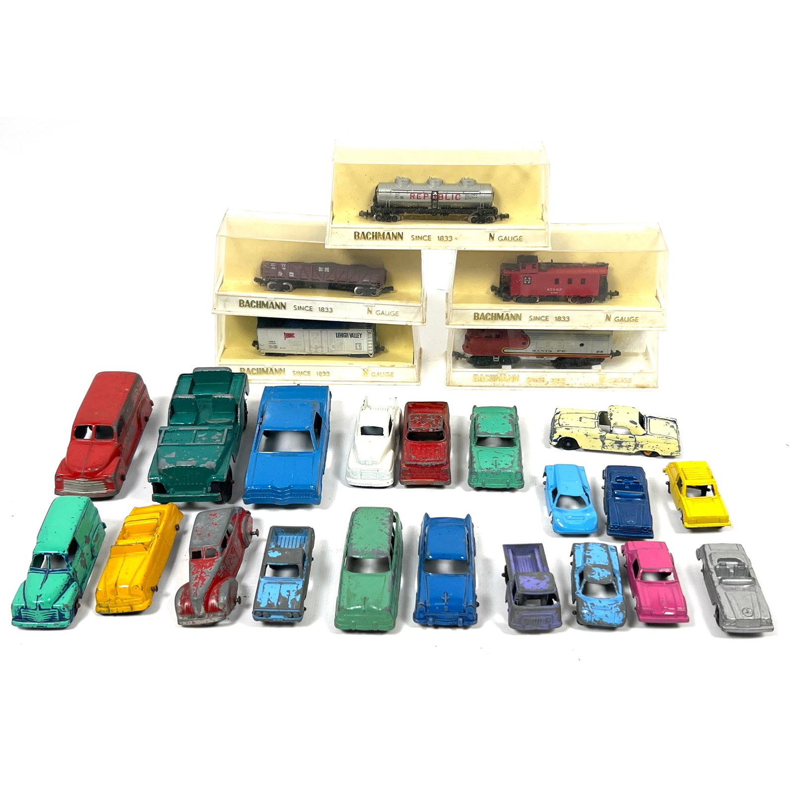20 vintage die-cast metal vehicles and 5 N gauge model train cars. The die-cast vehicles are manufac (1 of 15)