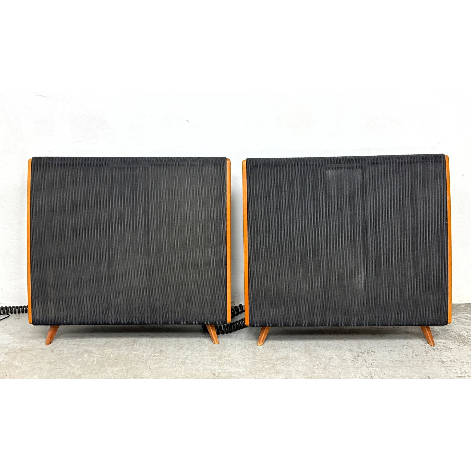 Pair of vintage Quad electrostatic loudspeakers manufactured in Huntingdon, England, by The Acoustic: Pair of vintage Quad electrostatic loudspeakers manufactured in Huntingdon, England, by The Acoustical Mfg. Co. Ltd. Curved rectangular form characteristic of the ESL 57 model Dimensions: Height: 31 i