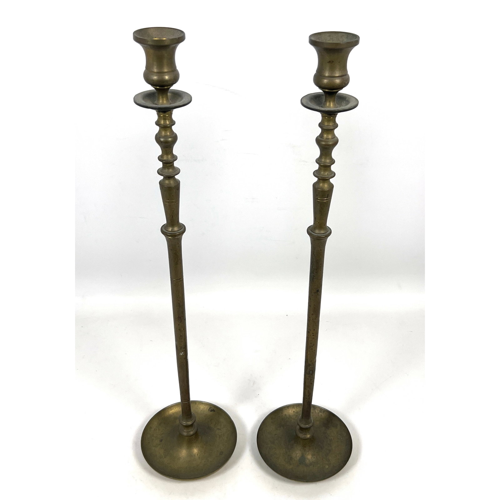 Pair of tall brass candlesticks designed in a traditional Neoclassical style. Solid brass. (1 of 9)