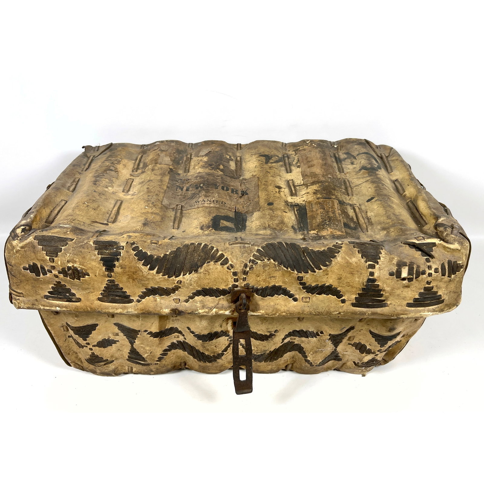Early 20th century traveling trunk. South American petaca, a style of chest traditional to Argentina: Early 20th century traveling trunk. South American petaca, a style of chest traditional to Argentina, Uruguay, and Brazil. Natural rawhide stretched Dimensions: Height: 12 inches, Width: 25 inches,