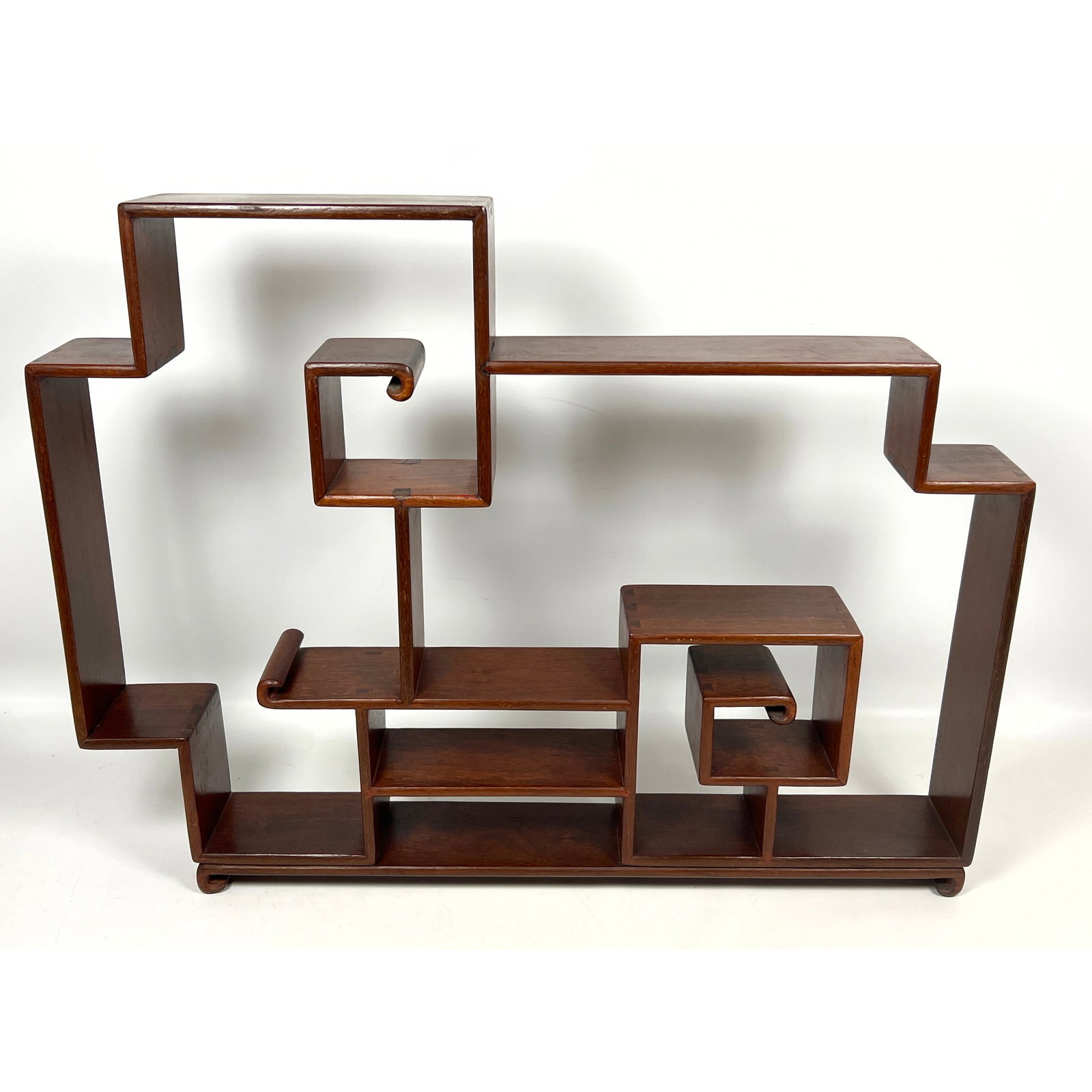 Traditional Chinese style tabletop curio display shelf. Small Etagere for small objects. Dovetail Jo: Traditional Chinese style tabletop curio display shelf. Small Etagere for small objects. Dovetail Jointed corners. Dimensions: Height: 23 inches, Width: 29.5 inches. ---