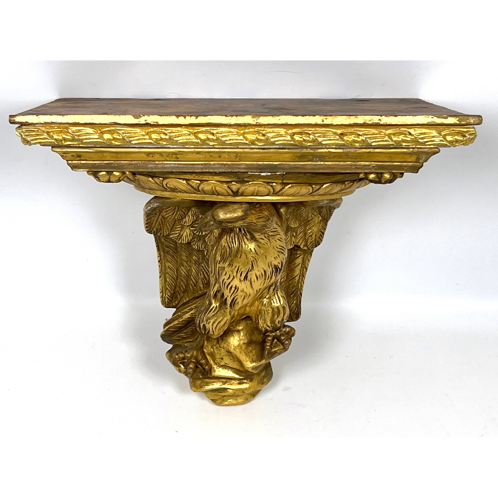 George II style Gilt Gesso and Wood Wall Bracket Shelf. Eagle design.: George II style Gilt Gesso and Wood Wall Bracket Shelf. Eagle design. Dimensions: Height: 12 inches, Width: 13.5 inches, Depth: 10 inches. ---