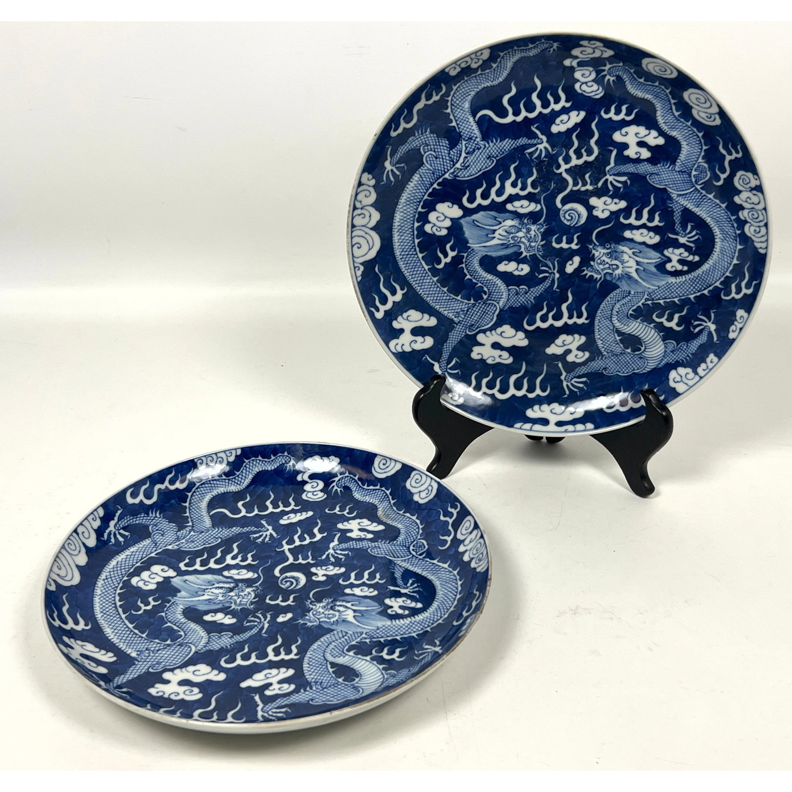 Pair Chinese of shallow circular porcelain plates decorated in underglaze blue. Each plate features (1 of 12)