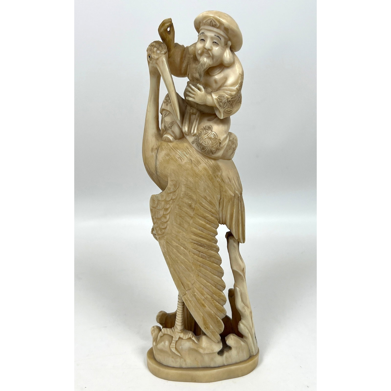 Antique Japanese Okimomo Carving of Figure Riding Crane.: Antique Japanese Okimomo Carving of Figure Riding Crane. Dimensions: Height: 9.5 inches, Width: 3 inches, Depth: 2 inches. --- US Packing and Shipping charge: In house shipping available. Will be calc