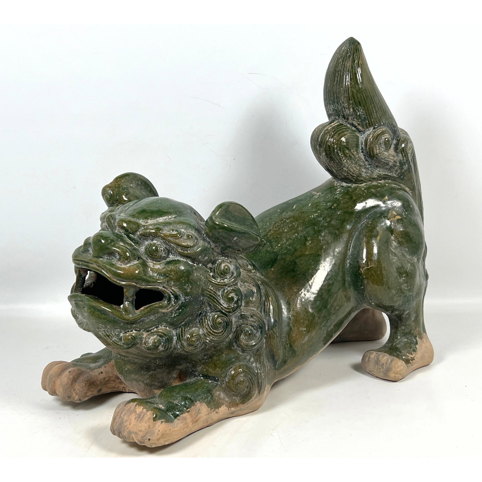 Chinese glazed pottery figure of a guardian lion, or Shi. Foo Dog. (1 of 11)