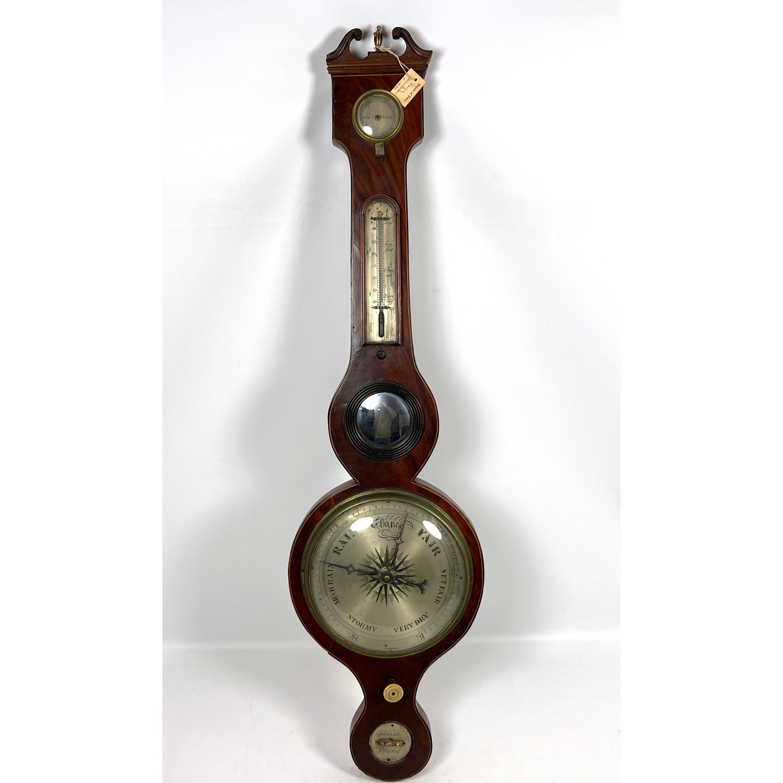 Antique banjo-style wheel barometer constructed of mahogany veneer with boxwood and ebony stringing. (1 of 15)