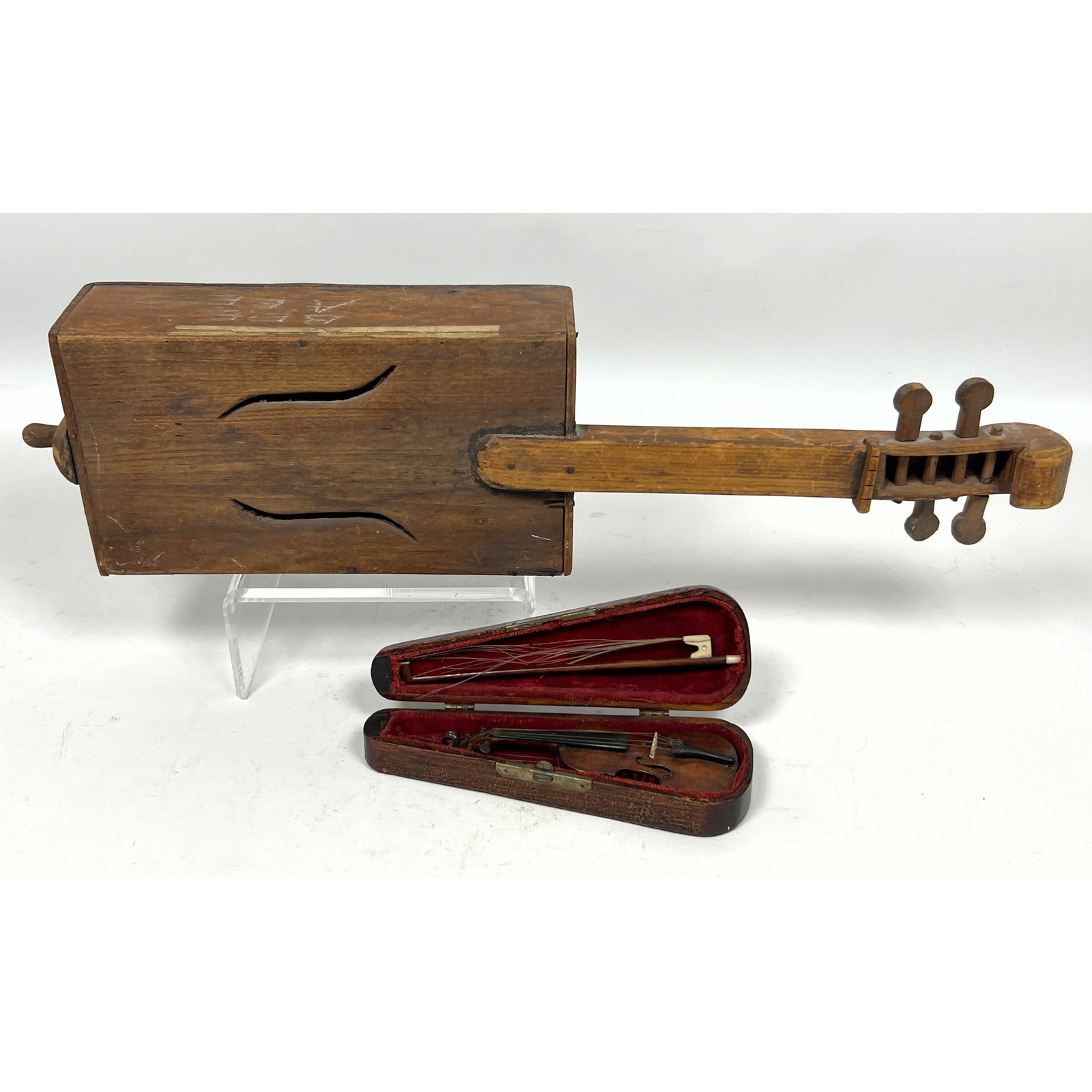 2 instruments. Folk style Cigar Box Fiddle and Detailed miniature violin model with a custom case. (1 of 16)