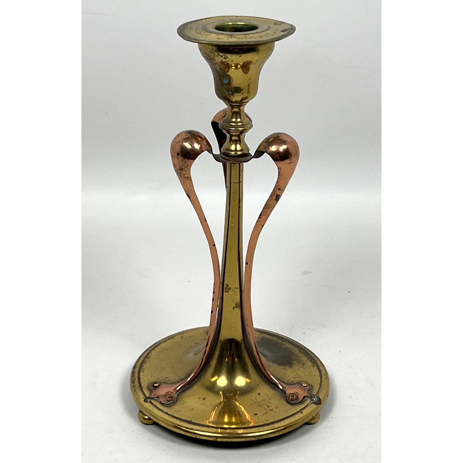 Art Nouveau period mixed-metal candlestick constructed from brass and copper. (1 of 10)