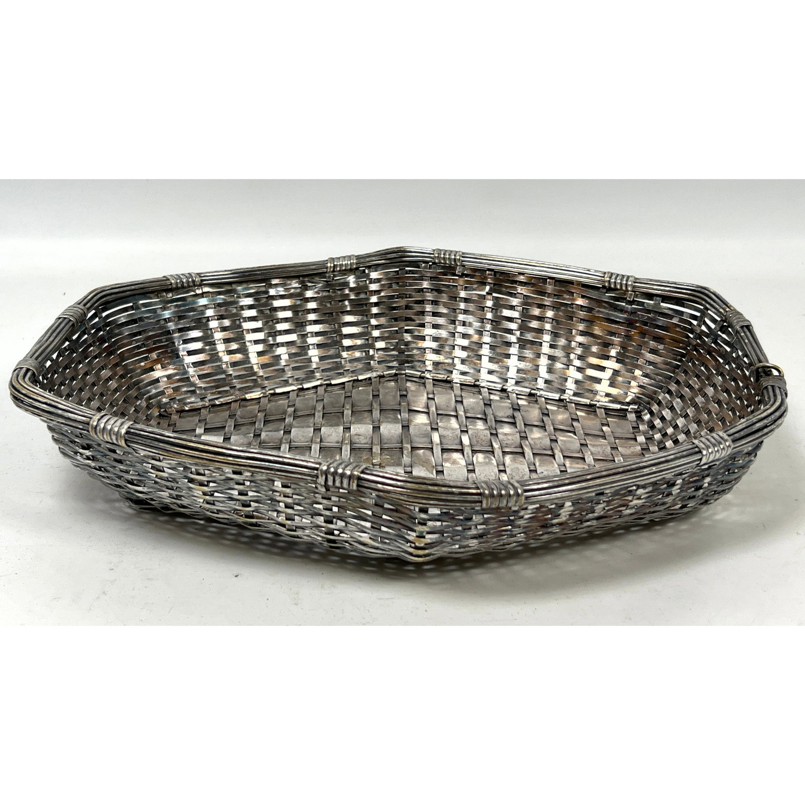 Gallia Christofle woven Silverplate basket bowl.: Gallia Christofle woven Silverplate basket bowl. Dimensions: Height: 2.25 inches, Width: 12 inches, Depth: 10 inches. --- US Packing and Shipping charge: In house shipping available. Will be calculate