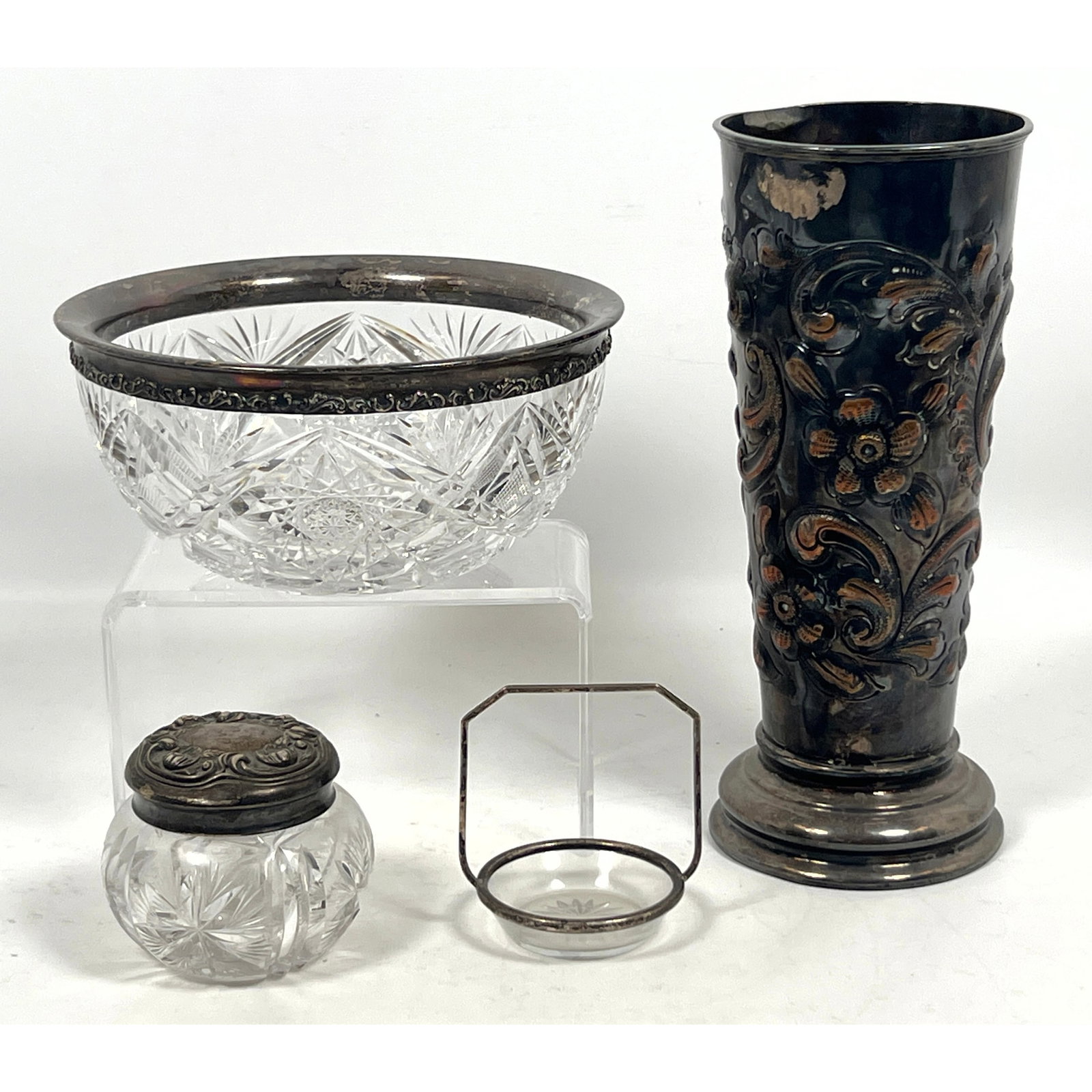 3pcs Antique Silver Lot. Sterling Silver mounted cut glass bowl. Sterling top powder jar. and Silve: 3pcs Antique Silver Lot. Sterling Silver mounted cut glass bowl. Sterling top powder jar. and Silver Plate Repousse Vase. Dimensions: Height: 11.25 inches, Width: 4.5 inches, Depth: 4.5 inches. --- US