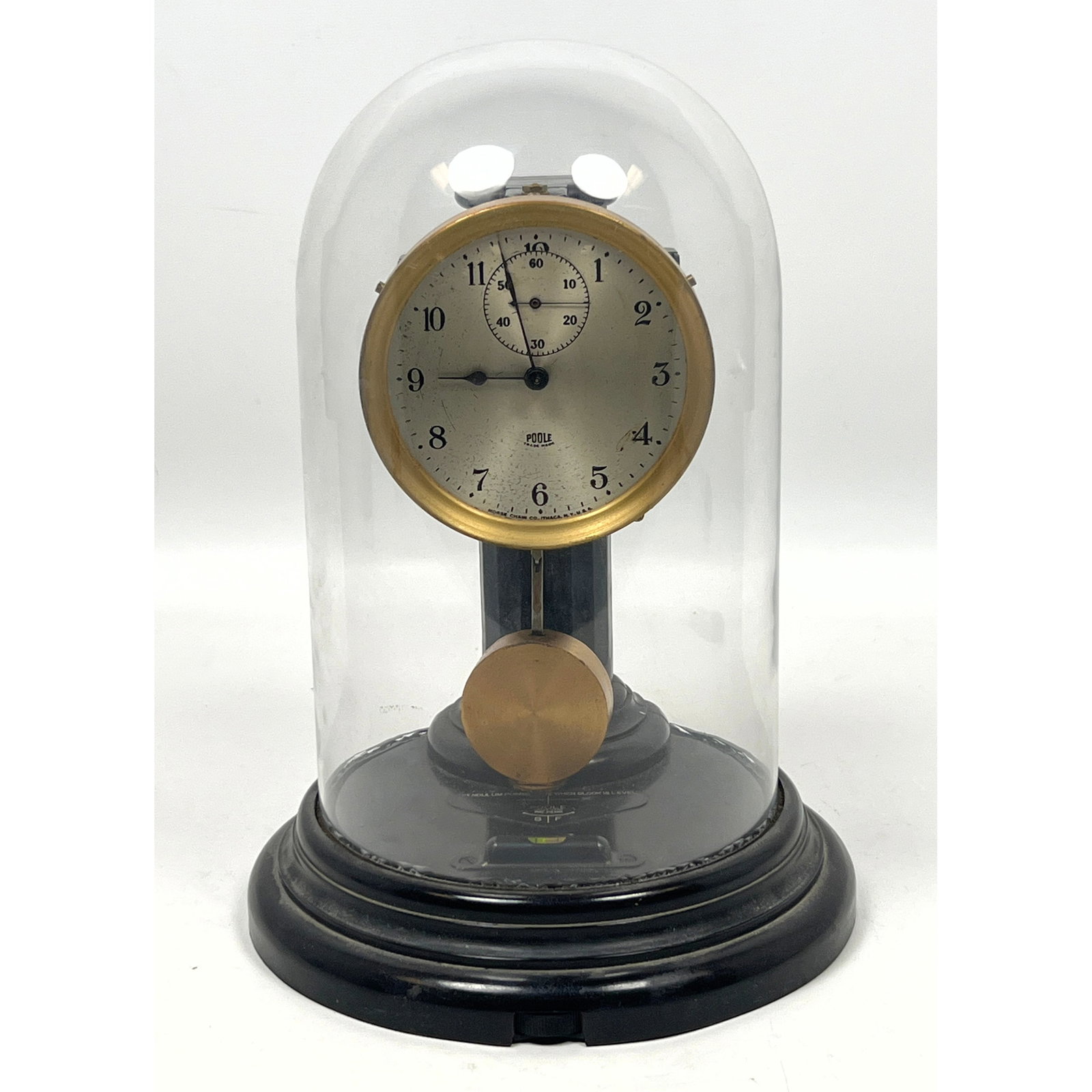 early electromagnetic mantel clock manufactured by the Morse Chain Co. of Ithaca, New York, under th: early electromagnetic mantel clock manufactured by the Morse Chain Co. of Ithaca, New York, under the Poole trade name. Dimensions: Height: 10.5 inches, Width: 7 inches, Depth: 7 inches. ---