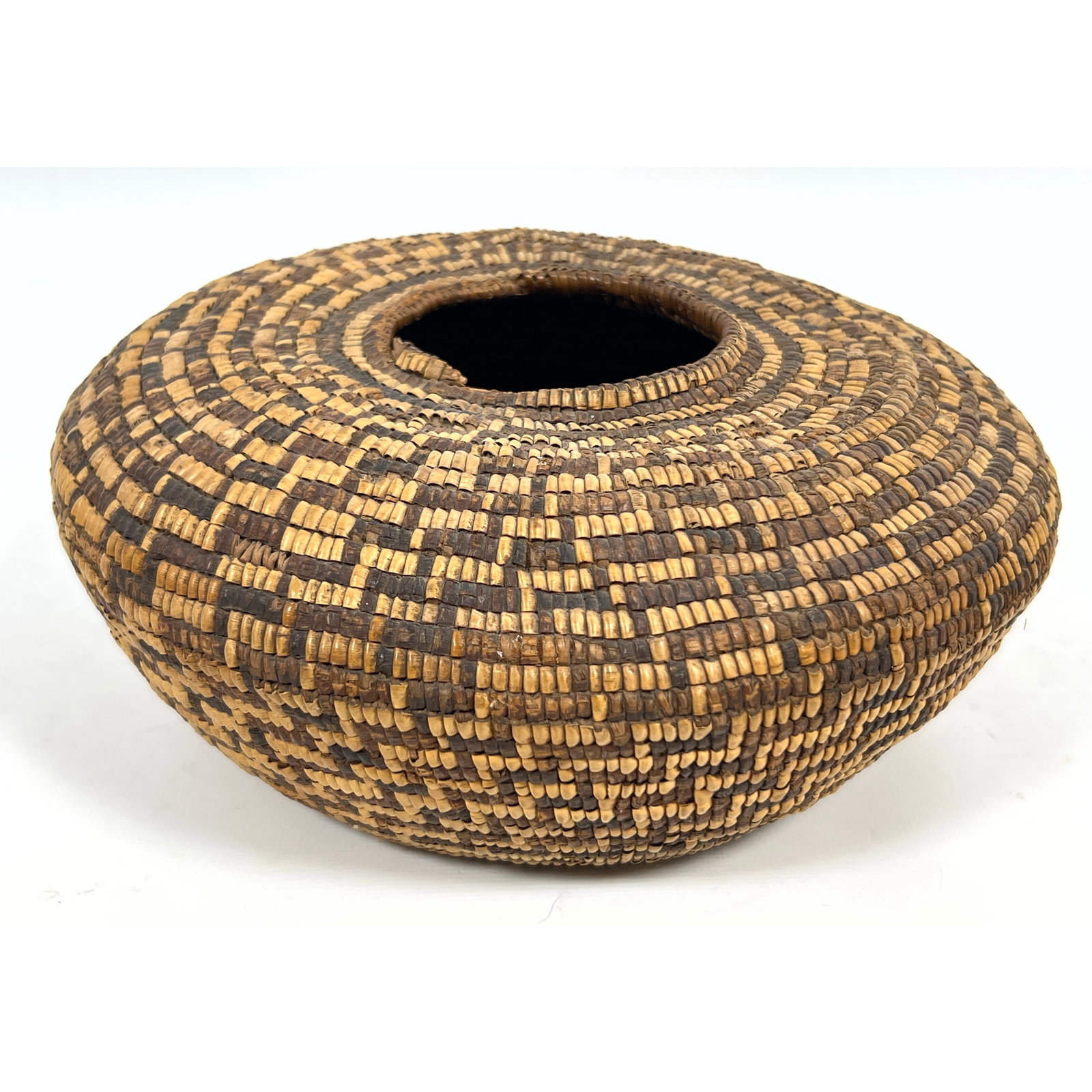 Vintage Coiled basketry vessel. Exhibiting characteristics common to Akimel O'odham (Pima) or Yokuts (1 of 11)