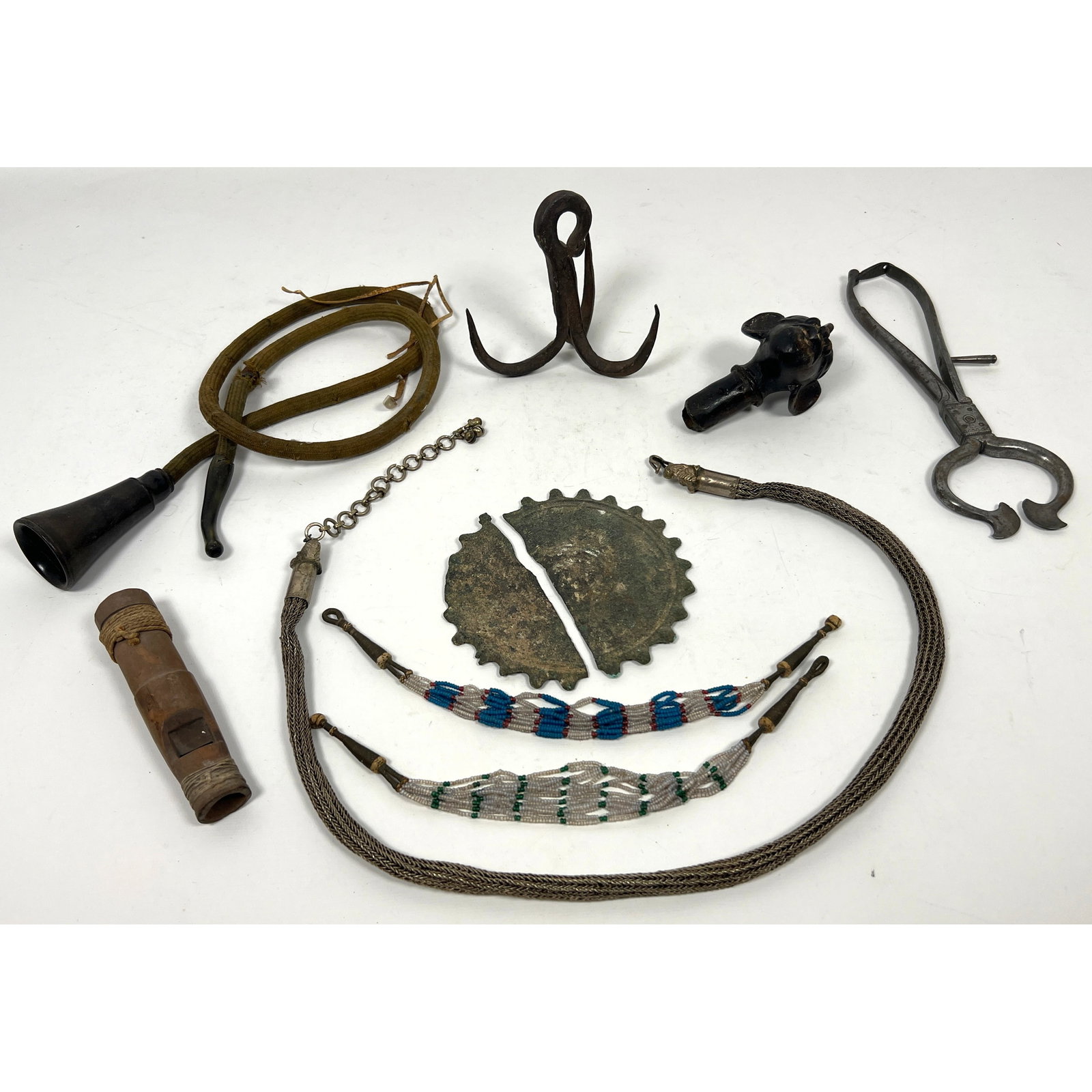 Eclectic collection of ethnographic items. The group includes an early 20th century acoustic hearing (1 of 20)