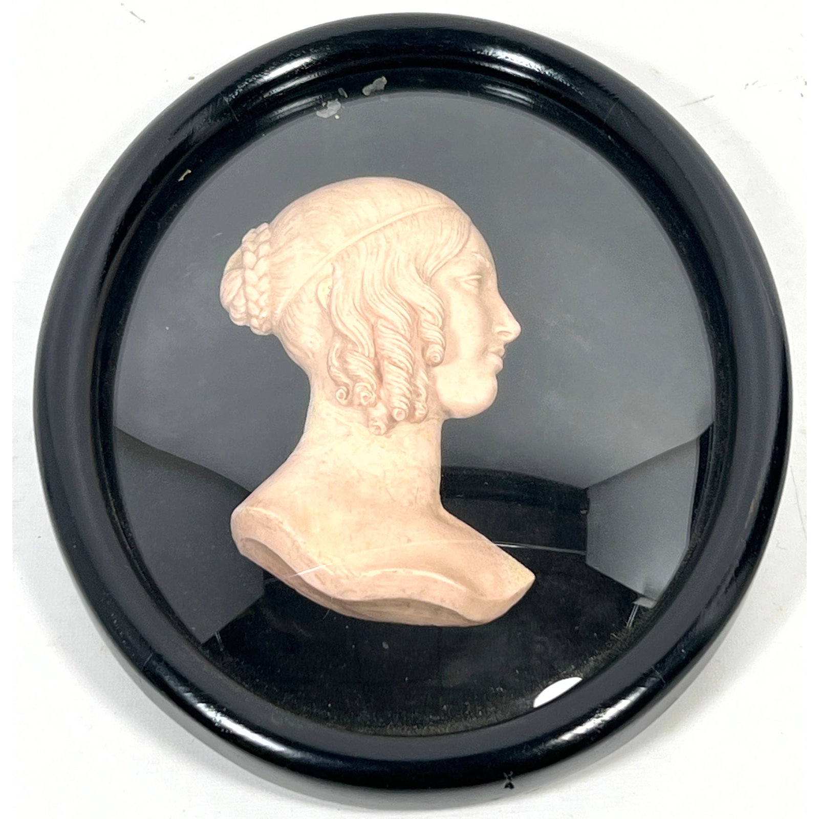 Antique Neoclassical-style Wax carved sculpture portrait profile relief bust depicts a woman in prof: Antique Neoclassical-style Wax carved sculpture portrait profile relief bust depicts a woman in profile with a Regency-era hairstyle featuring tight temple ringlets and a braided chignon Dimensions: H