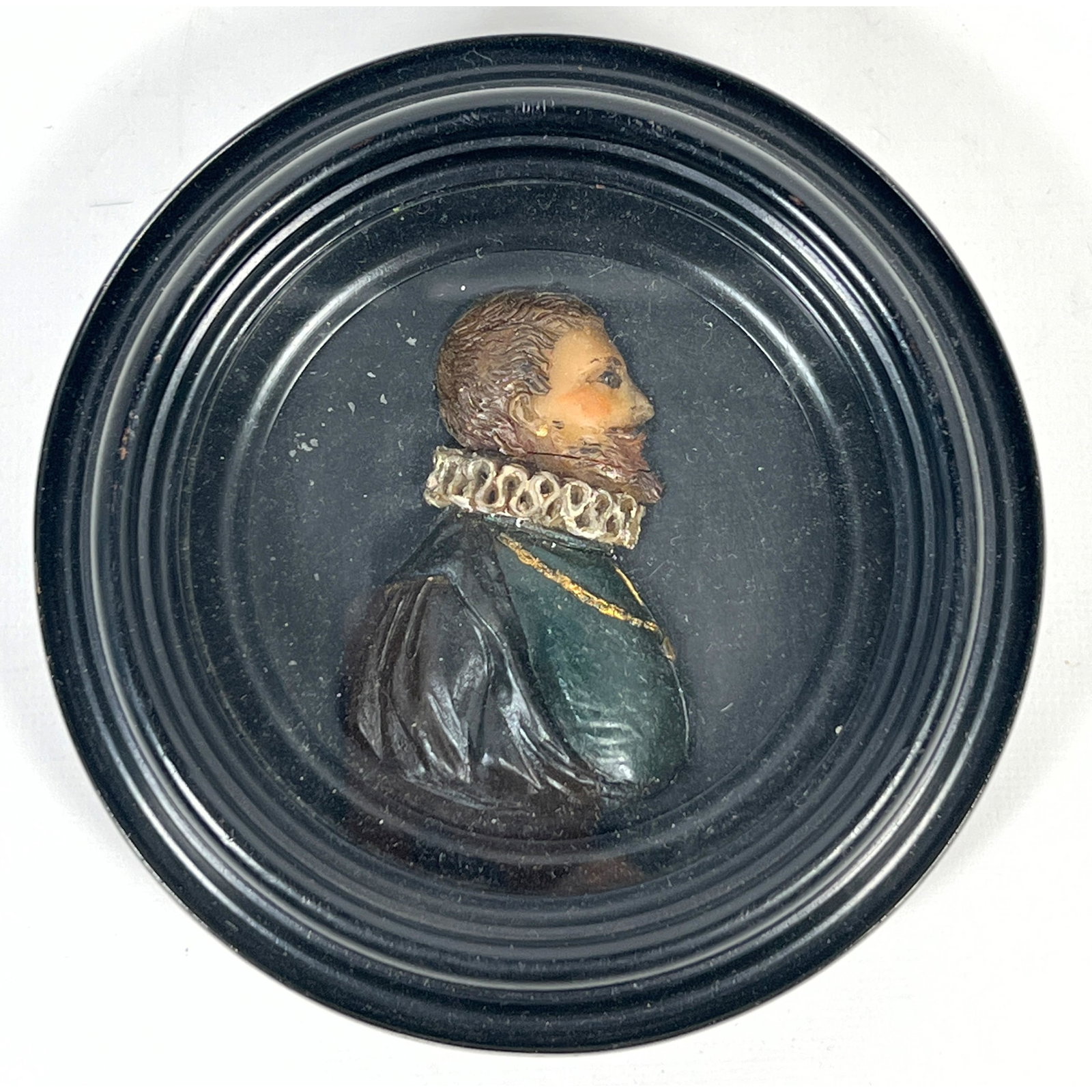Antique polychrome wax relief sculpture features a profile portrait of a gentleman rendered in the s: Antique polychrome wax relief sculpture features a profile portrait of a gentleman rendered in the style of late 16th-century See video: https://youtube.com/watch?v=PNUrQIA4yVw Dimensions: Height: 5.2