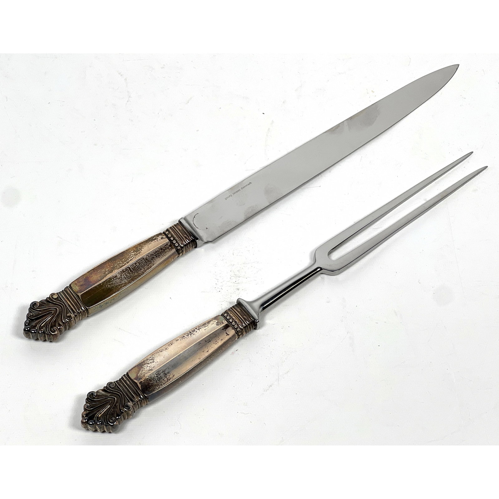Johan Rohde for Georg Jensen Acorn Pattern Sterling Carving Set: Johan Rohde for Georg Jensen Acorn Pattern Sterling Carving Set Dimensions: Height: 13.25 inches, Width: 1 inches, Depth: .5 inches. Weight: 19.65 Troy ozs. --- US Packing and Shipping charge: In hous