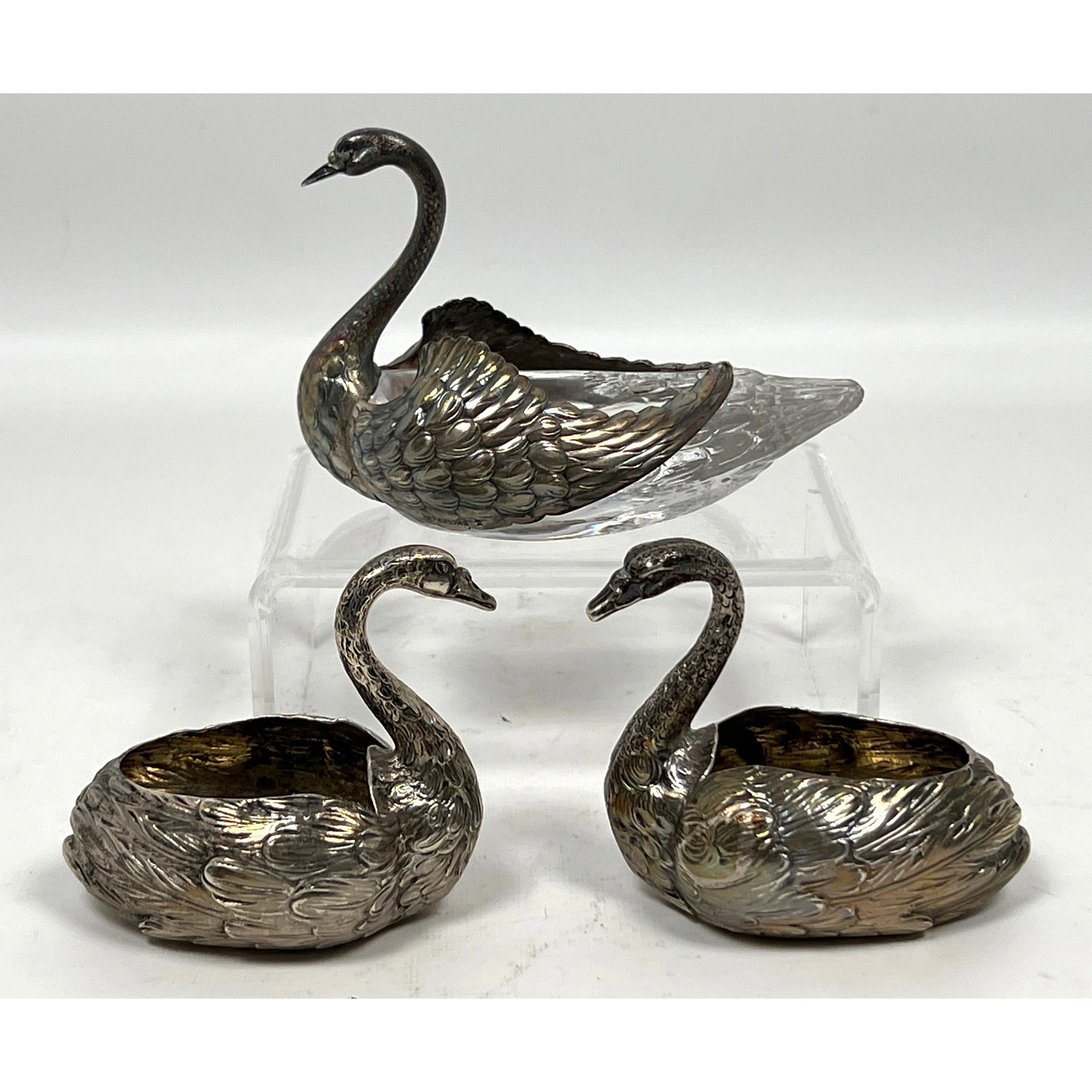 2pcs Sterling Swan Salt Cellar Bowls. 1 with crystal body, and 2 Solid Sterling.: 2pcs Sterling Swan Salt Cellar Bowls. 1 with crystal body, and 2 Solid Sterling. Dimensions: Height: 3.75 inches, Width: 3.25 inches, Depth: 5.25 inches. Weight: 5.24 Troy ozs. --- US Packing and Ship
