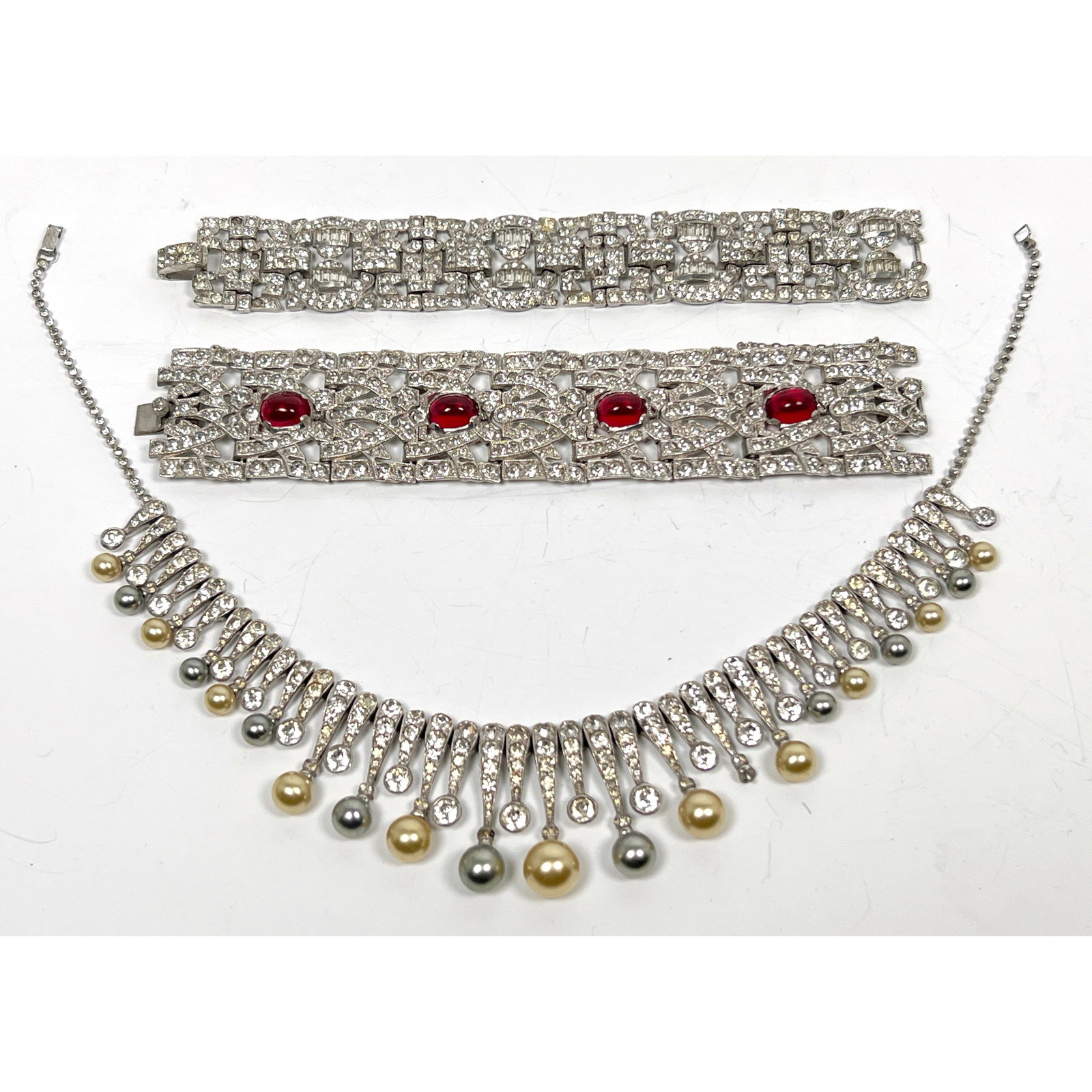 3pcs Vintage Costume Jewelry. Rhinestones and Colored Stones. 7 inch rhinestone, 7 inch red stone: 3pcs Vintage Costume Jewelry. Rhinestones and Colored Stones. 7 inch rhinestone, 7 inch red stone Dimensions: Height: 7 inches, Width: 1.5 inches, Depth: .25 inches. : L: 14 inches. --- US Packing and