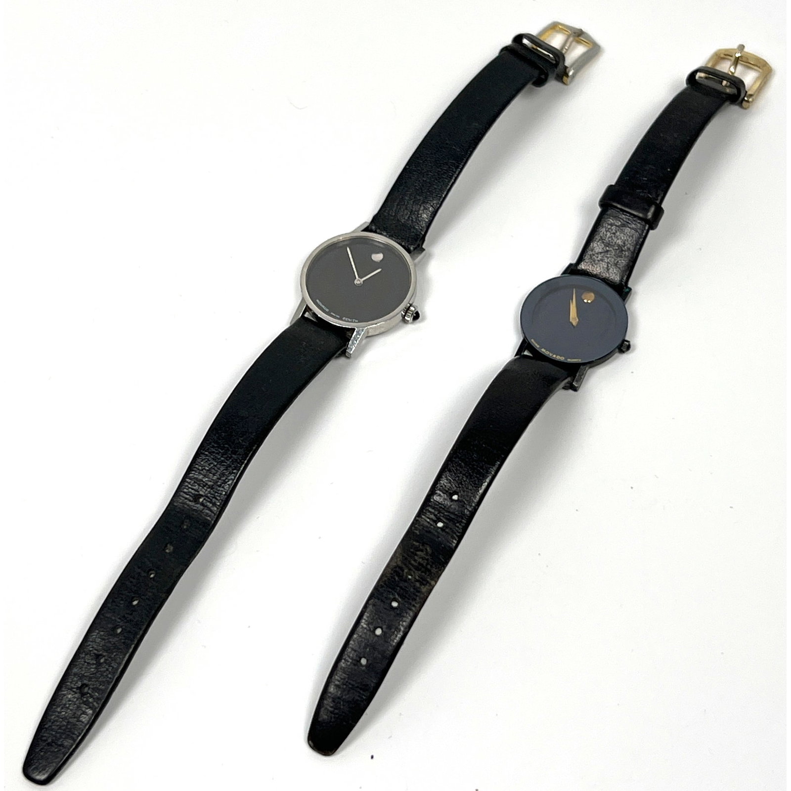 2pc MOVADO Museum Classic Woman's Watch. One has Stainless Steel Case.: 2pc MOVADO Museum Classic Woman's Watch. One has Stainless Steel Case. Dimensions: Height: 7.75 inches, Width: 1 inches, Depth: .25 inches. --- US Packing and Shipping charge: In house shipping