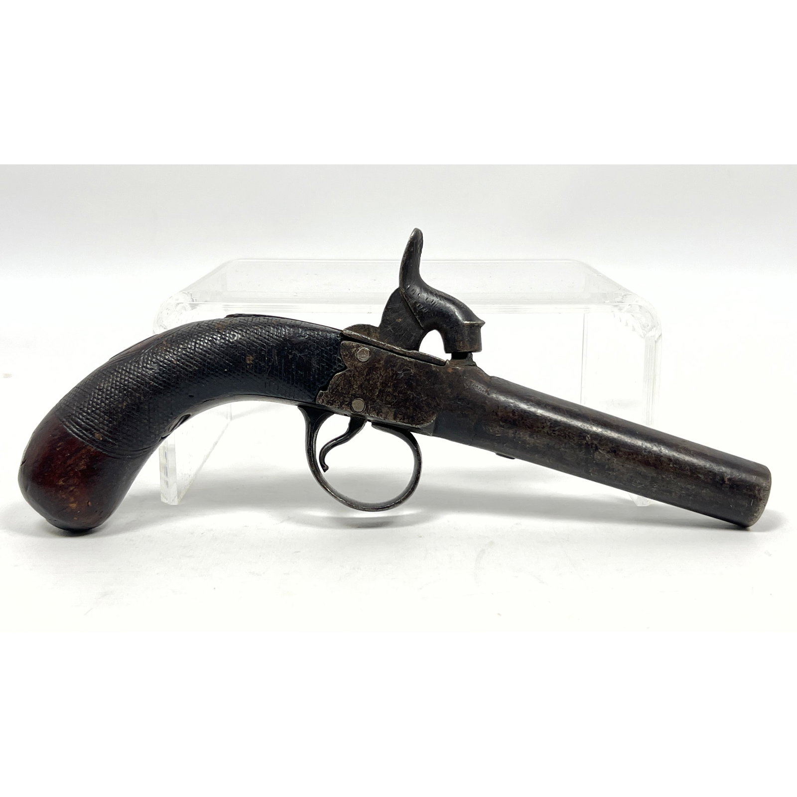 Single-shot antique pocket pistol is of box-lock percussion configuration, featuring a round smoothb: Single-shot antique pocket pistol is of box-lock percussion configuration, featuring a round smoothbore barrel Dimensions: Height: 7.5 inches, Width: 1 inches, Depth: 4.5 inches. --- US Packing and Sh
