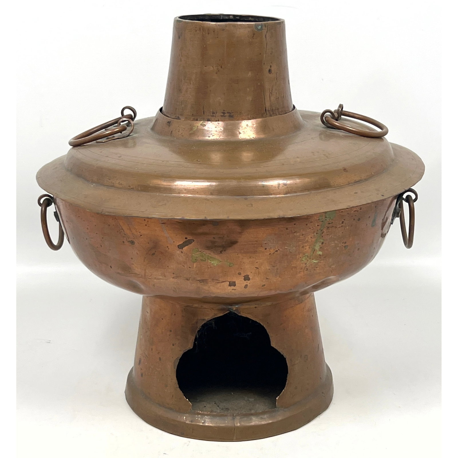 Traditional Chinese charcoal-burning hot pot, also known as a huoguo, made of copper with a tinned i (1 of 11)