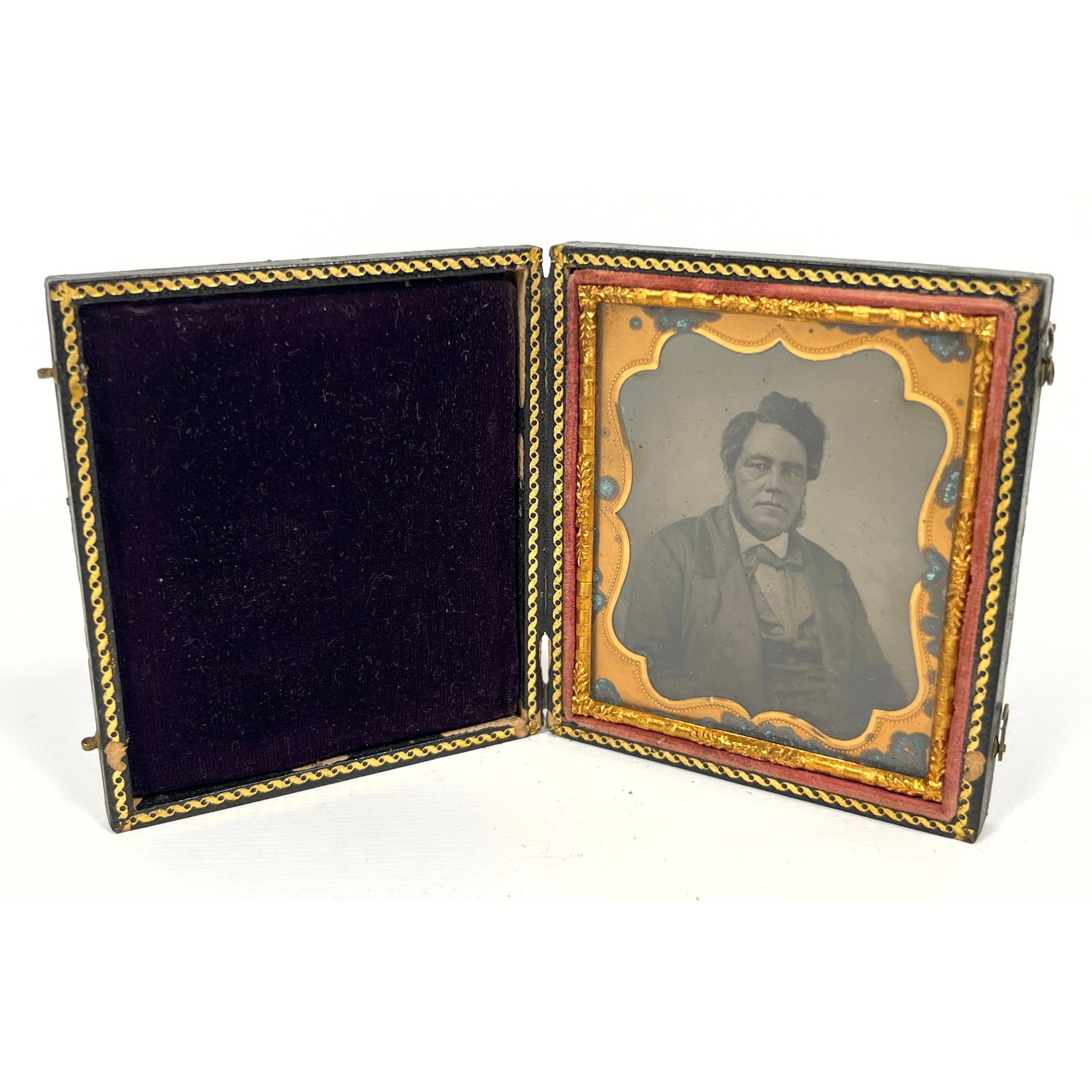 Mid-19th century sixth-plate daguerreotype features a formal studio portrait of a middle-aged gentle (1 of 10)