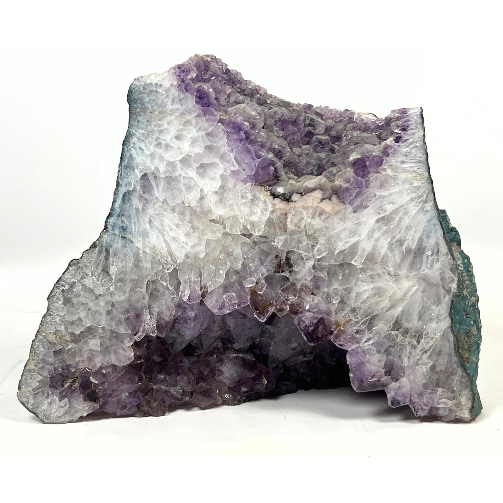 Large Amethyst cathedral geode specimen features a deep interior cavity lined with crystalline quart (1 of 10)