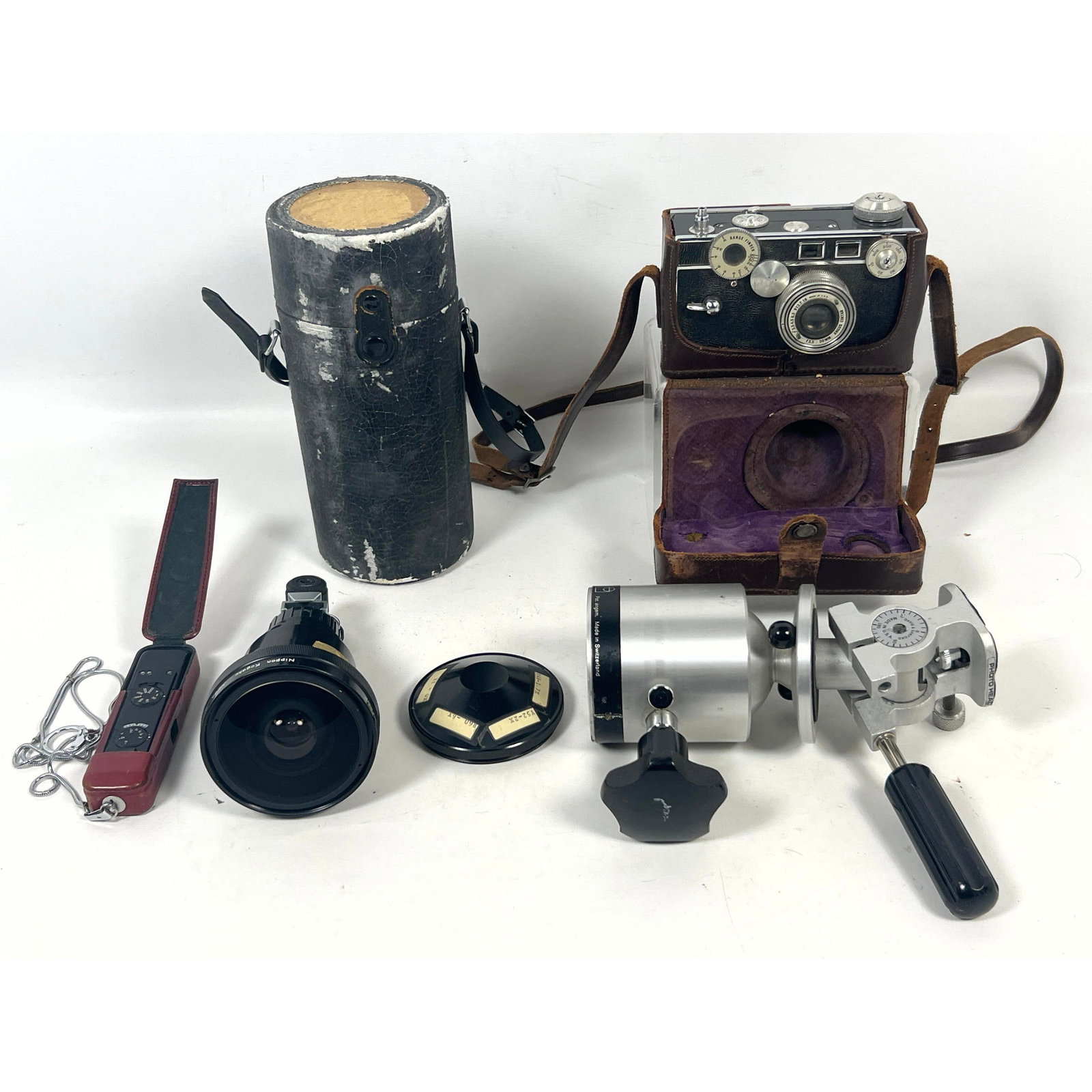 Vintage cameras and professional accessories, headlined by a rare specialized Nikon lens. The center (1 of 17)
