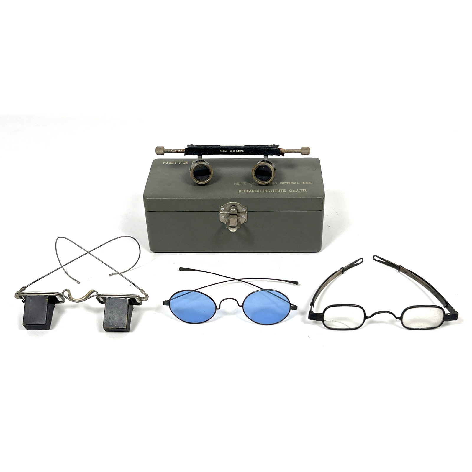 4 pairs Vintage Spectacle Glasses. Recumbent Spectacles. Philadelphia retractable arm Glass. Blue gl: 4 pairs Vintage Spectacle Glasses. Recumbent Spectacles. Philadelphia retractable arm Glass. Blue glass. as is magnifying glasses. Dimensions: Height: 2.5 inches, Width: 6.5 inches, Depth: 3 inches.
