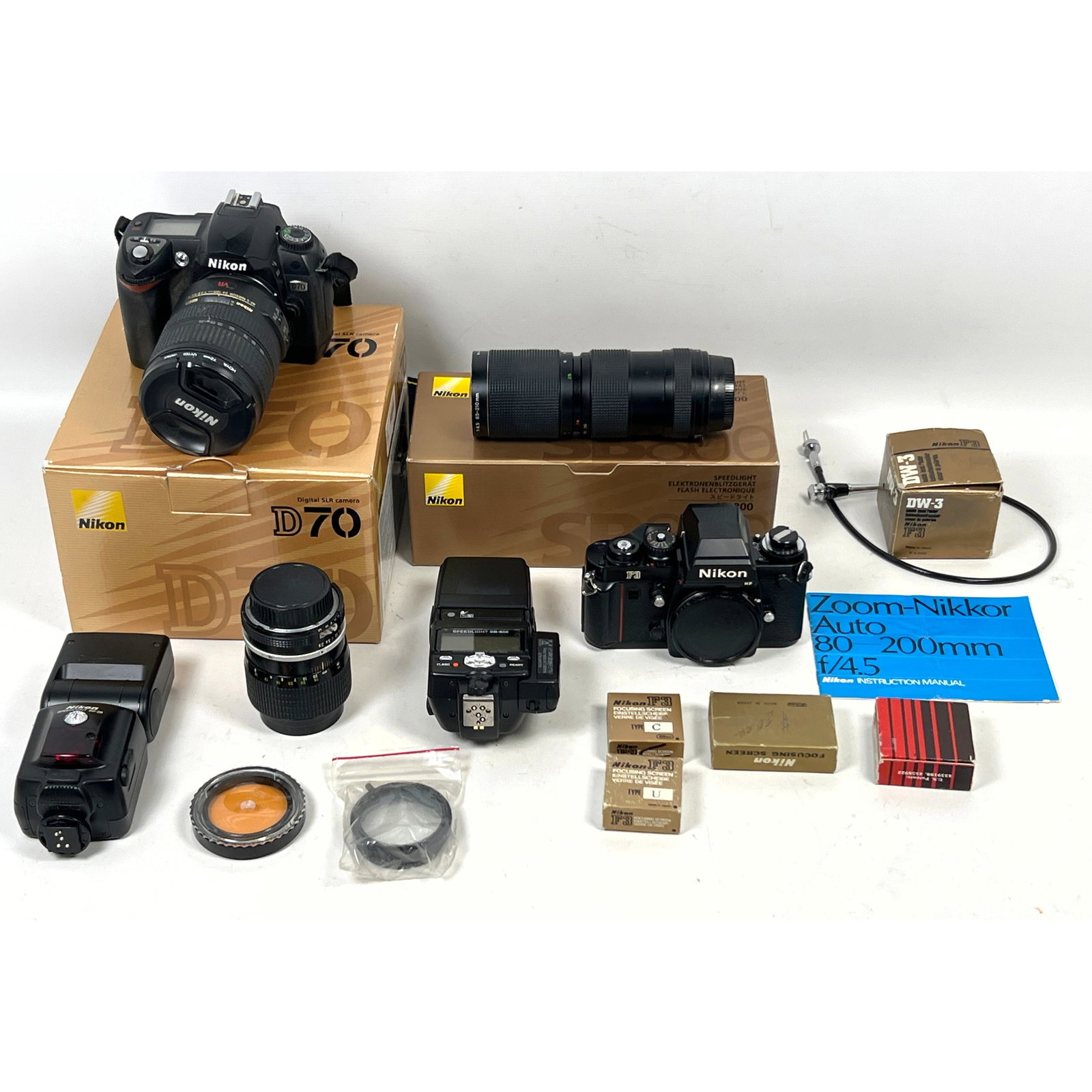 Diverse collection of Nikon photographic equipment, including both film and digital SLR bodies, lens (1 of 15)