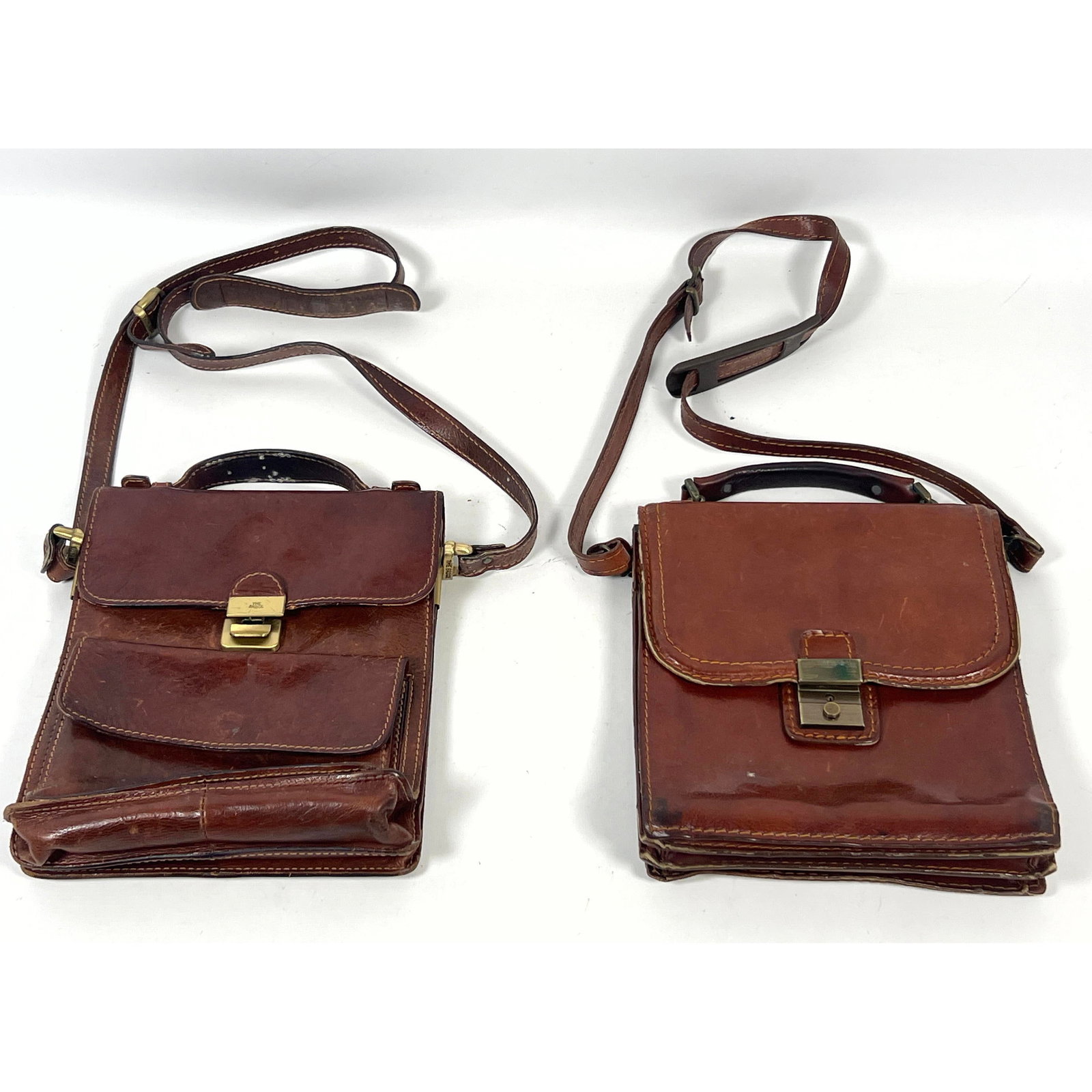 2pcs The Bridge Leather Satchel Bag. Side Bag.: 2pcs The Bridge Leather Satchel Bag. Side Bag. Dimensions: Height: 10 inches, Width: 9 inches, Depth: 2 inches. --- US Packing and Shipping charge: In house shipping available. Will be calculated