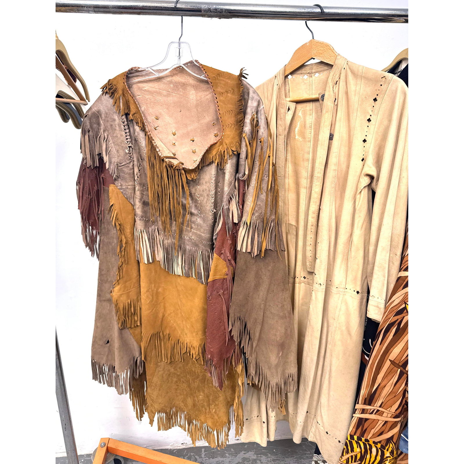 2pcs Vintage Suede Jackets. Western and hippie-influenced aesthetics of the 1960s and 1970s. Patch: 2pcs Vintage Suede Jackets. Western and hippie-influenced aesthetics of the 1960s and 1970s. Patchwork tunic constructed from various shades of tan and brown suede. Long-line suede duster coat in a li