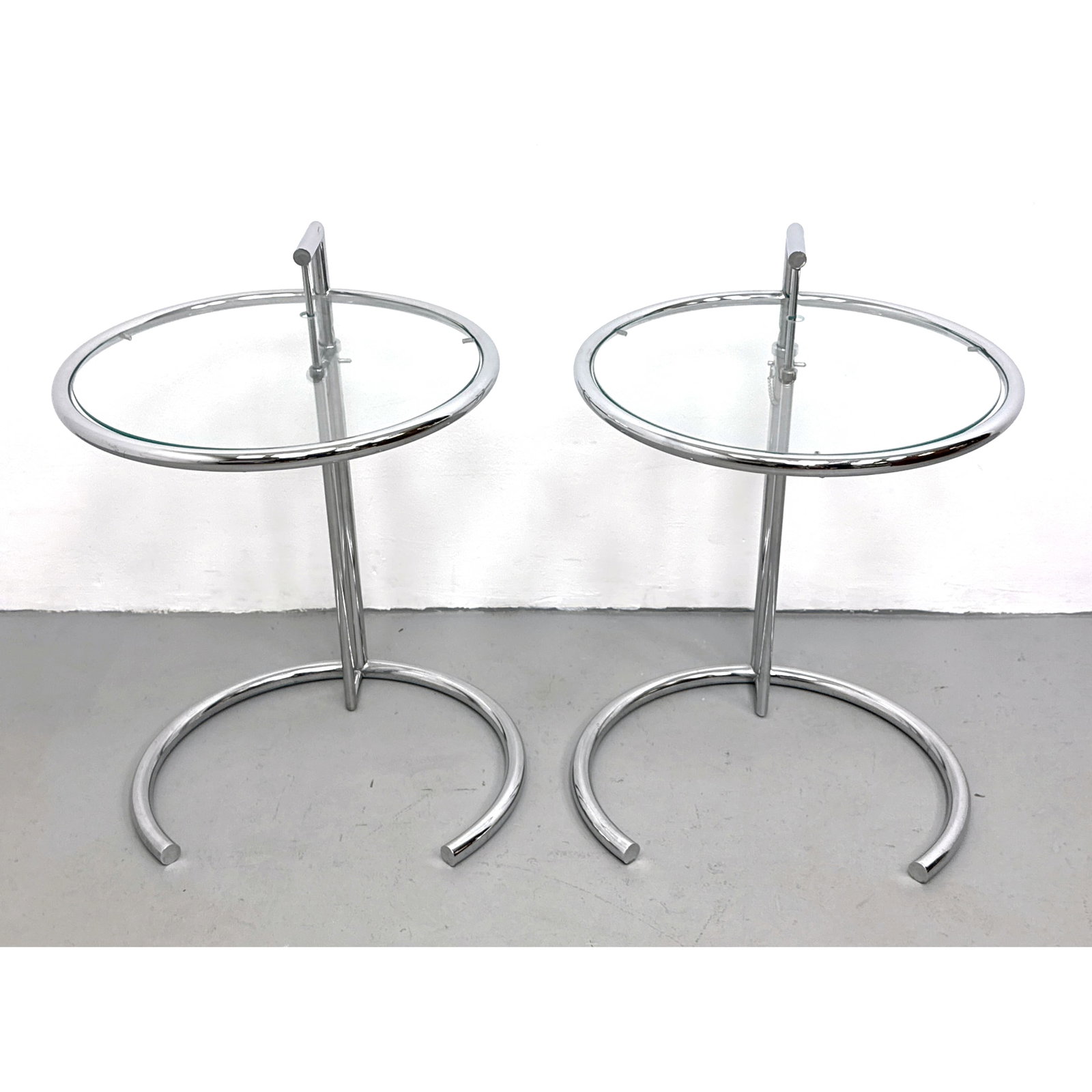 A Pair of Eileen Gray Style Adjustable Chrome and Glass Side Tables. Unsigned. (1 of 10)