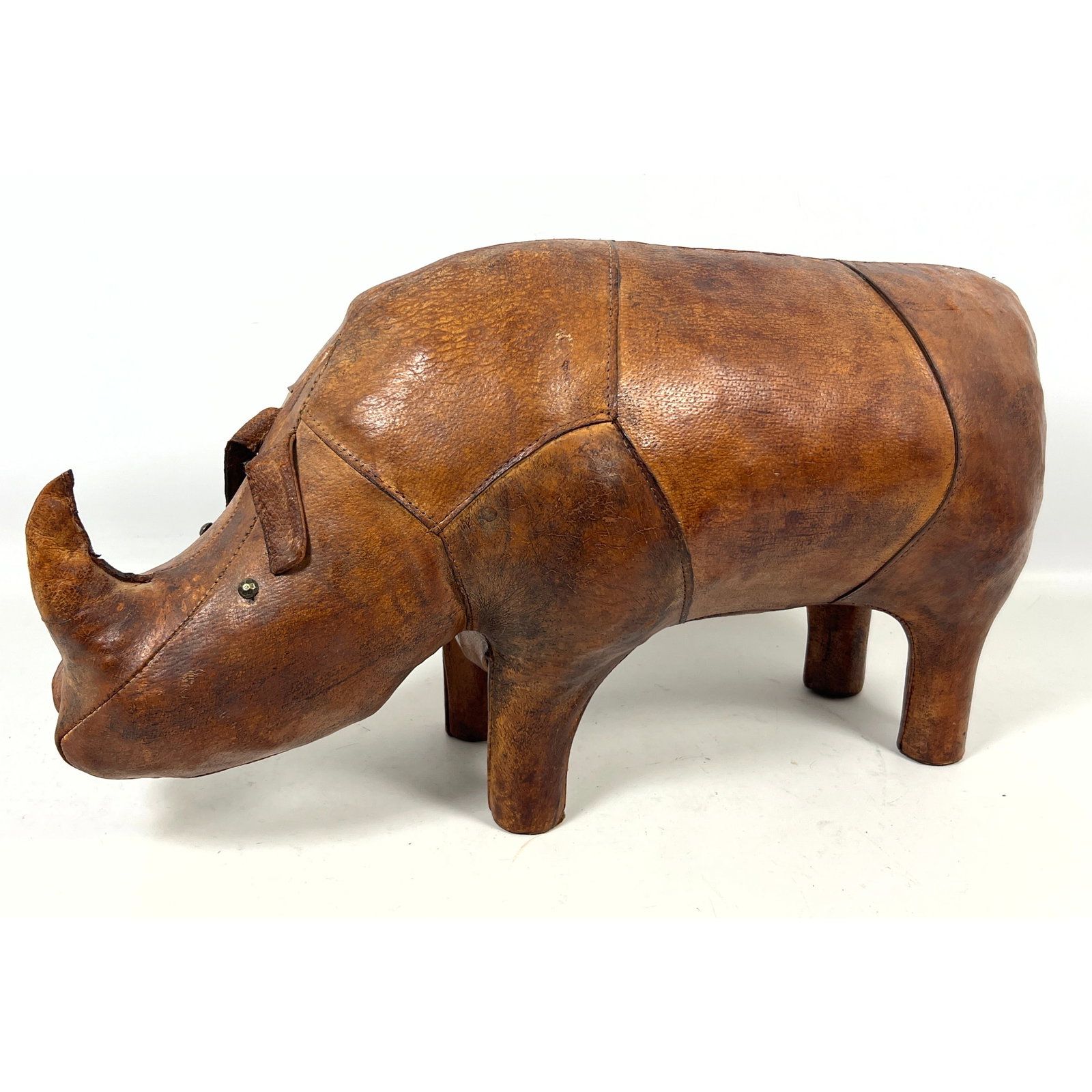 Omersa Vintage Hand-Stitched Leather Rhinoceros Figure Stool. Unmarked.: Omersa Vintage Hand-Stitched Leather Rhinoceros Figure Stool. Unmarked. Dimensions: Height: 13 inches, Width: 10 inches, Depth: 24 inches. --- US Packing and Shipping charge: In house shipping availab