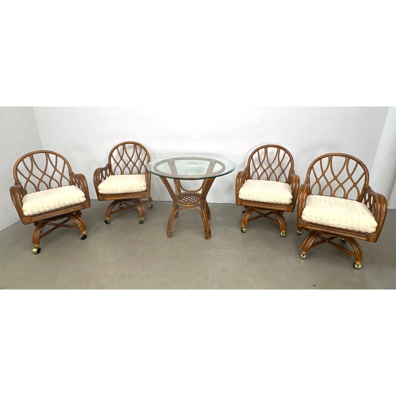 5pc Rattan and Glass Dinette Set with 4 Swivel Caster Armchairs and Pedestal Table in Tropical Style (1 of 19)