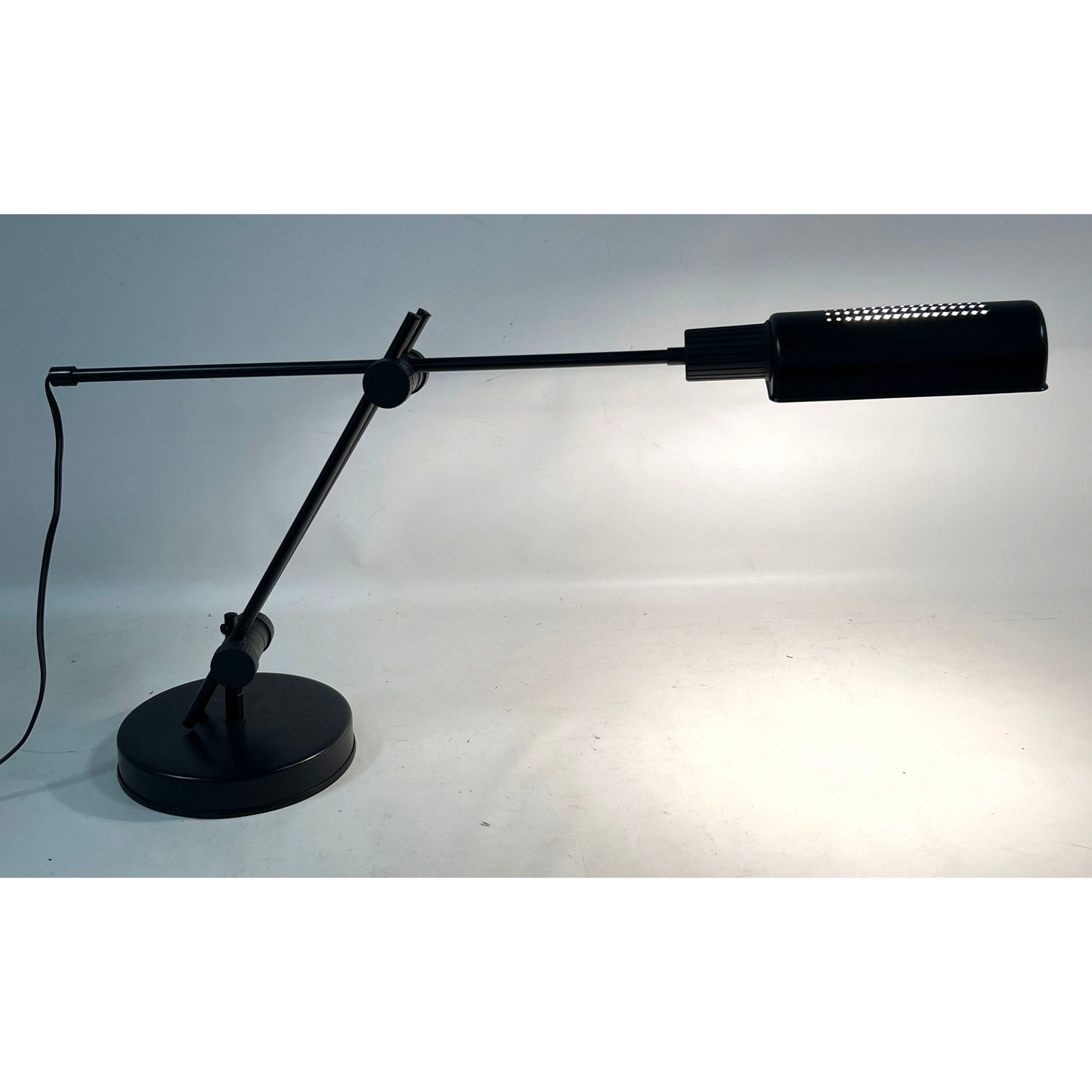 Veneta Lumi Italian Modern Adjustable Black Desk Lamp with Perforated Shade. Made in Italy.: Veneta Lumi Italian Modern Adjustable Black Desk Lamp with Perforated Shade. Made in Italy. Dimensions: Height: 7 inches, Width: 31 inches, Depth: 4 inches. --- US Packing and Shipping charge: In hous