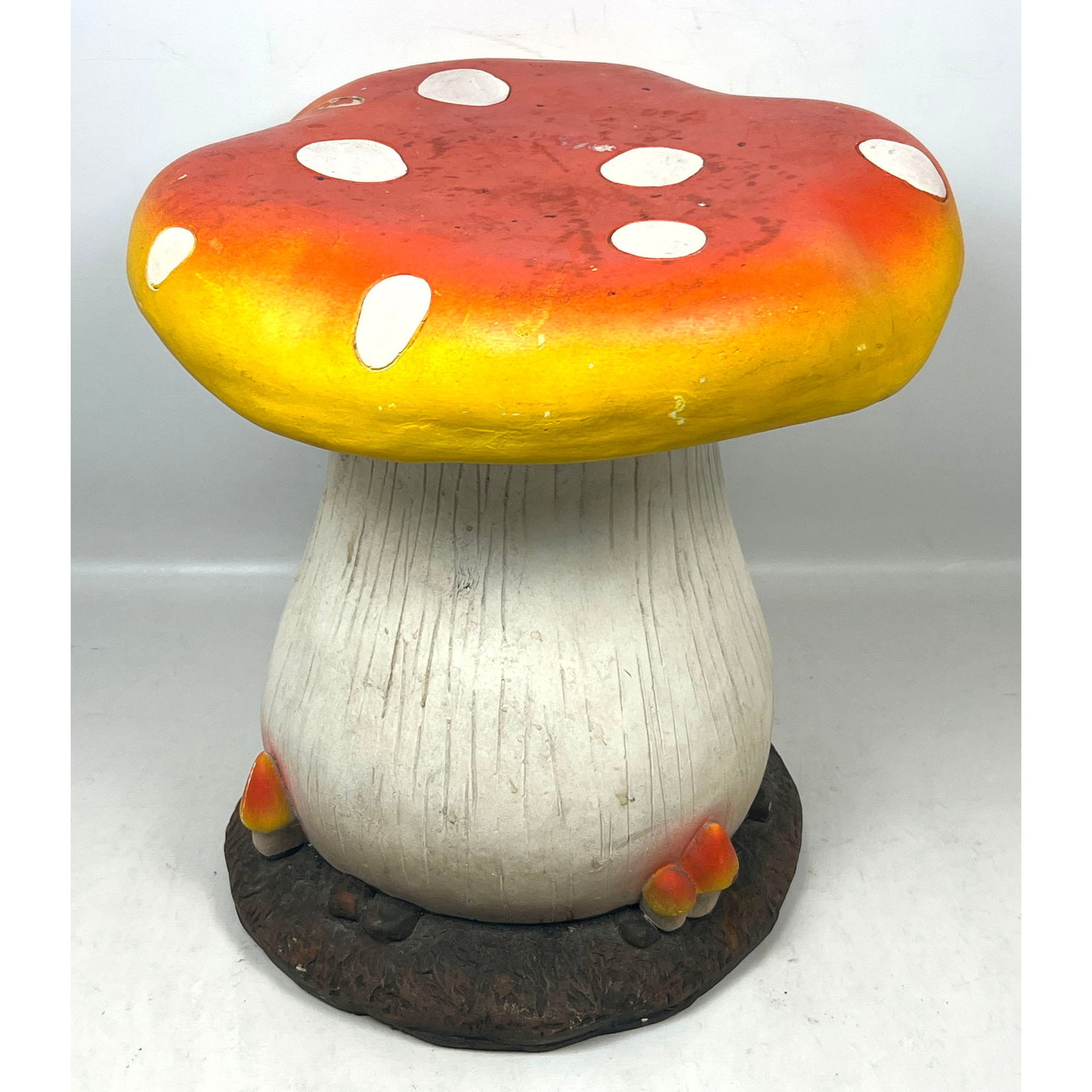 Large painted resin mushroom garden stool in the form of a fly agaric: Large painted resin mushroom garden stool in the form of a fly agaric Dimensions: Height: 15 inches, Width: 15 inches, Depth: 15 inches. ---