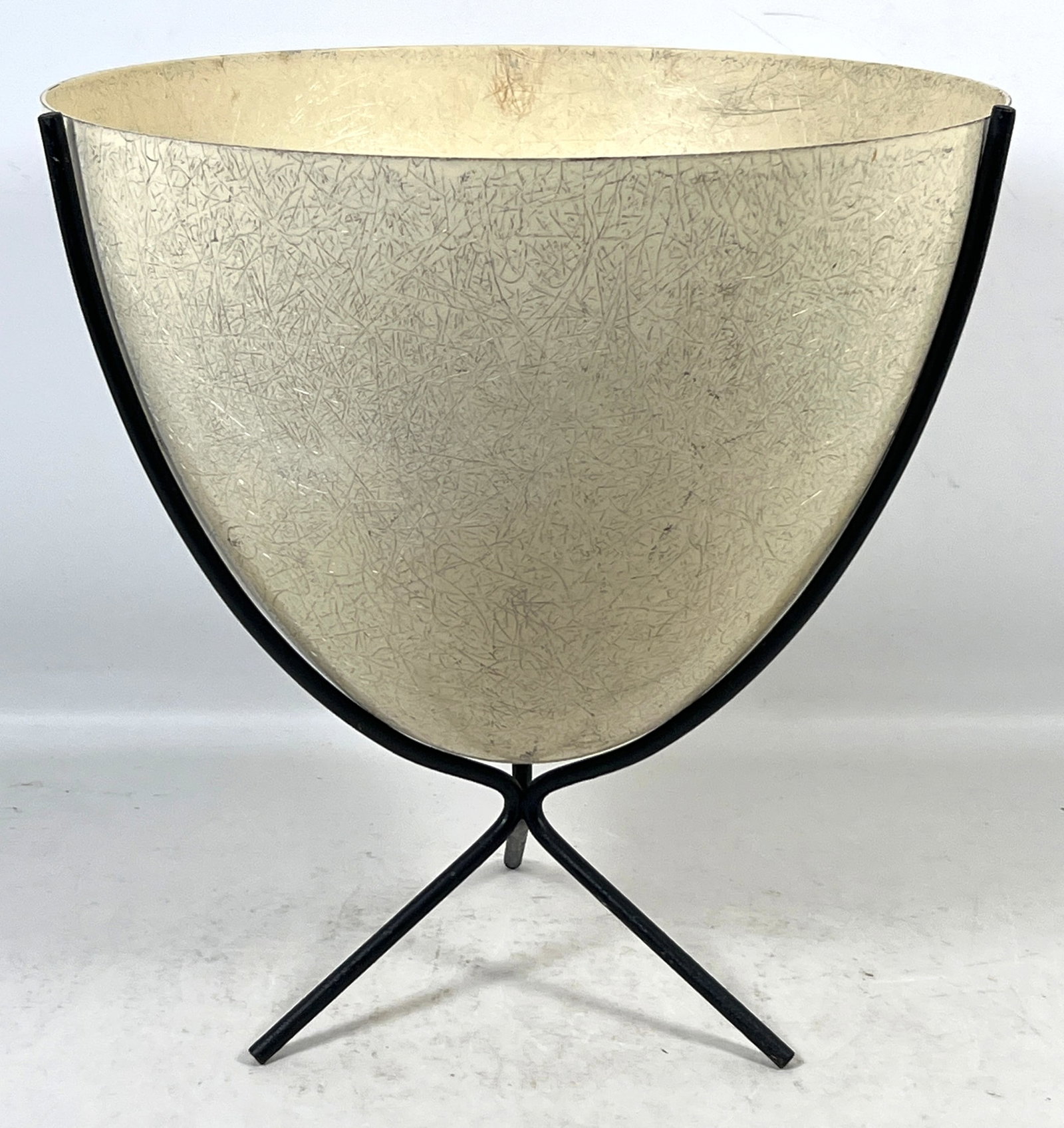 Kimsteel Corp Mid Century Modern Spun Fiberglass Bullet Planter on Black Wrought Iron Tripod Stand.: Kimsteel Corp Mid Century Modern Spun Fiberglass Bullet Planter on Black Wrought Iron Tripod Stand. Marked Kimsteel Corp San Francisco. Dimensions: Height: 16 inches, Width: 15.5 inches, Depth: 15.5 i