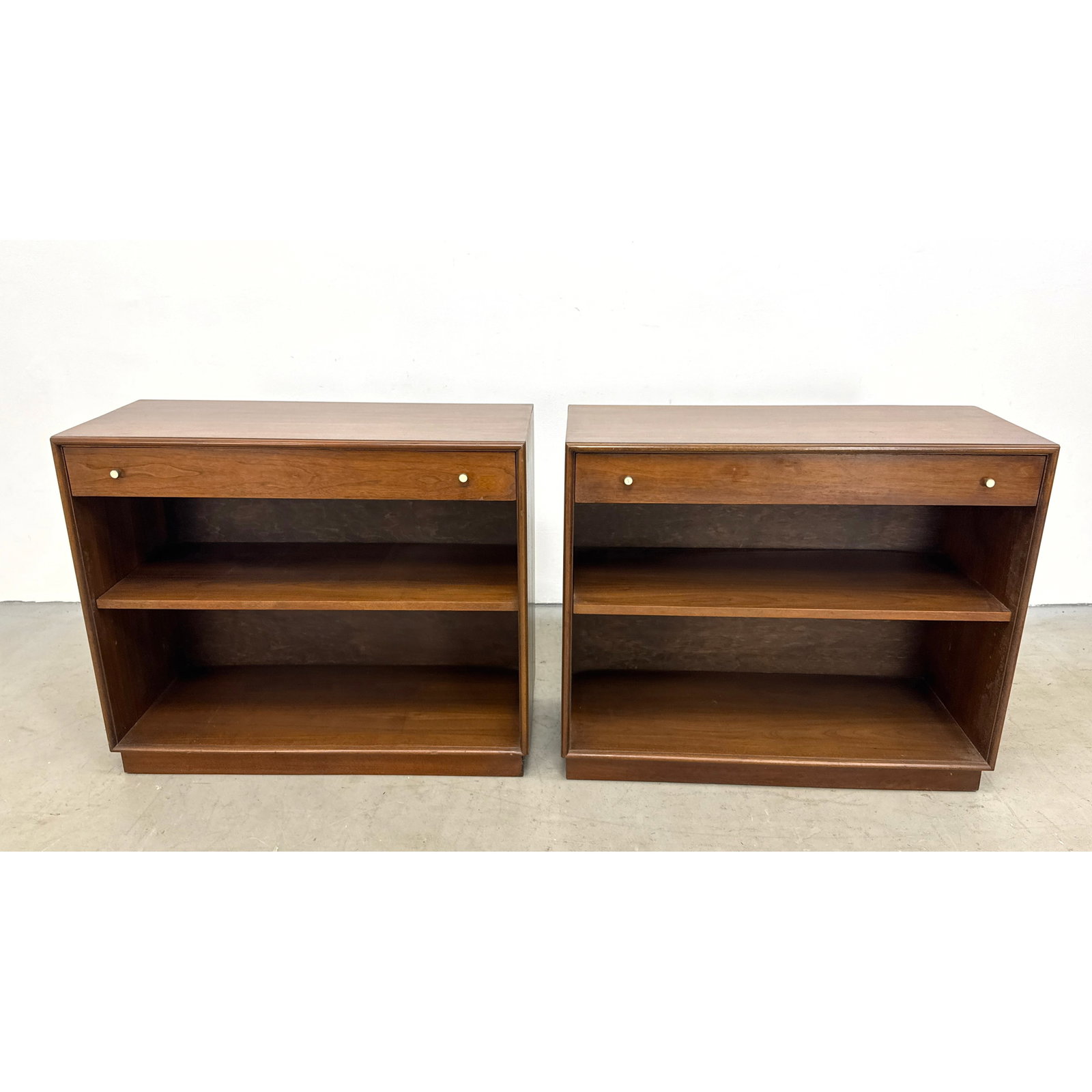 xxx Pair of Ramseur Furniture Company Mid Century Modern Walnut Low Bookcases with Single Top Drawer: xxx Pair of Ramseur Furniture Company Mid Century Modern Walnut Low Bookcases with Single Top Drawers and Open Shelving Dimensions: Height: 30.5 inches, Width: 36 inches, Depth: 16 inches. ---