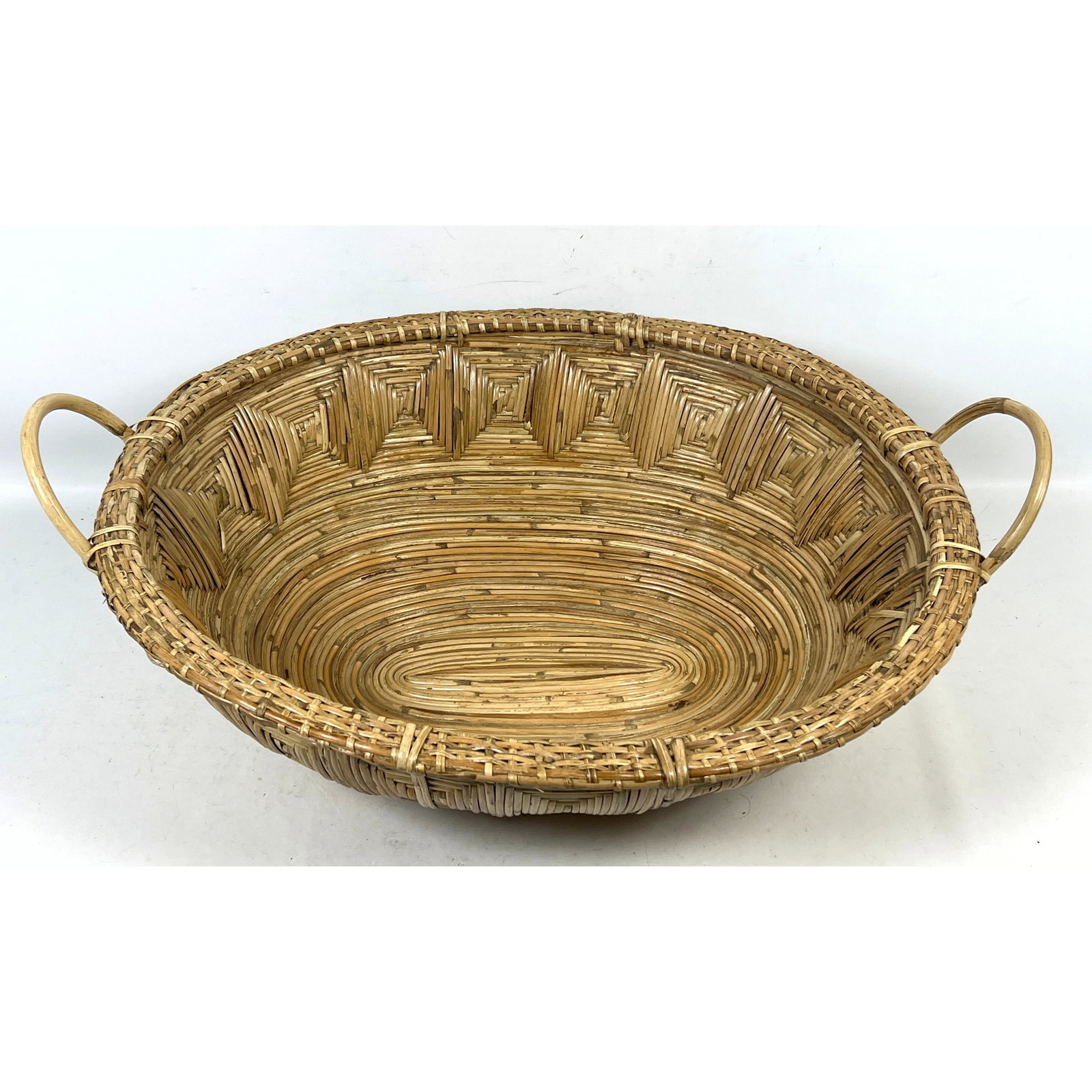 Large Italian Style Oval Woven Rattan Pencil Reed Centerpiece Basket with Curved Handles. (1 of 9)