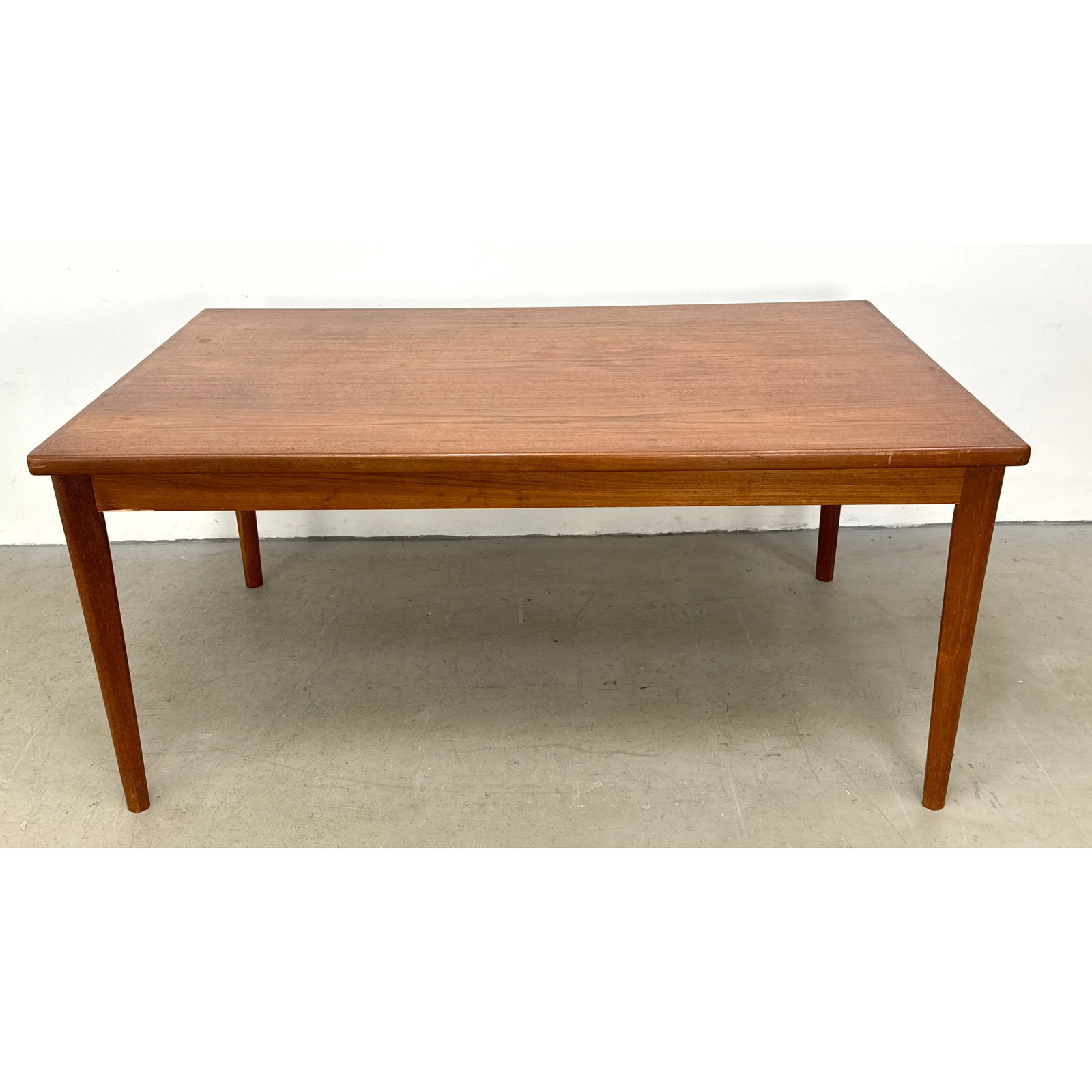 Mid-Century Danish Modern Teak Draw Leaf Dining Table. Refractory style.: Mid-Century Danish Modern Teak Draw Leaf Dining Table. Refractory style. . Includes: 2 - 20 inch leaves Dimensions: Height: 29 inches, Width: 63 inches, Depth: 39.25 inches. ---