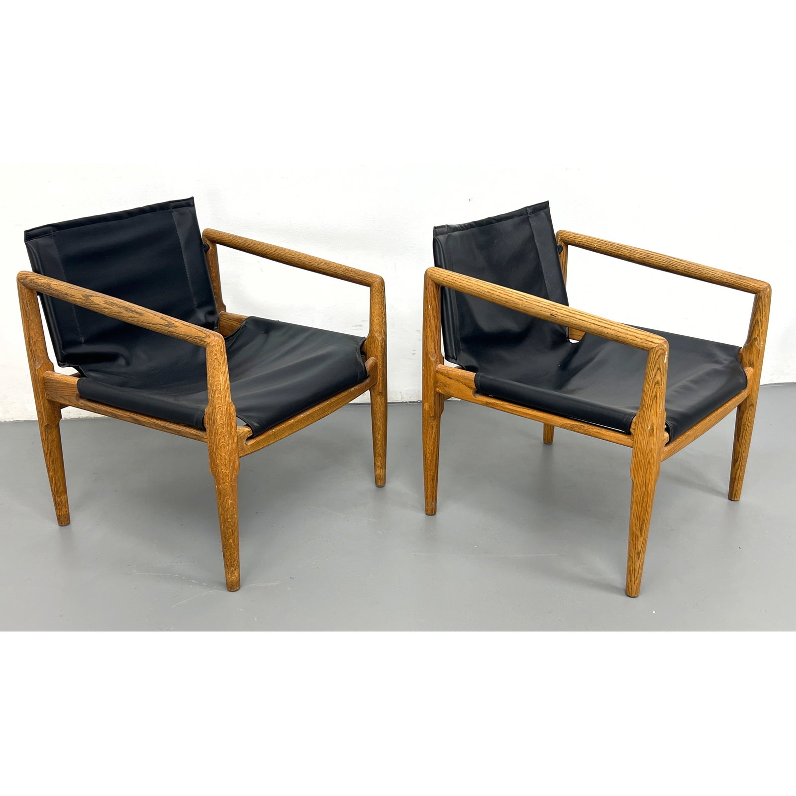 Pair Brown Saltman Doug Heaslett campaign chairs oak and vinyl: Pair Brown Saltman Doug Heaslett campaign chairs oak and vinyl Dimensions: Height: 28 inches, Width: 24 inches, Depth: 23.5 inches. - Seat Height: 14 inches ---