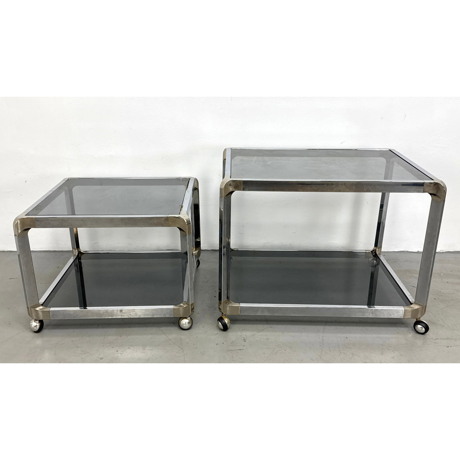 Pair of 1970s Modern Hollywood Regency style 2-tier chrome rolling side tables with gray glass inser (1 of 13)
