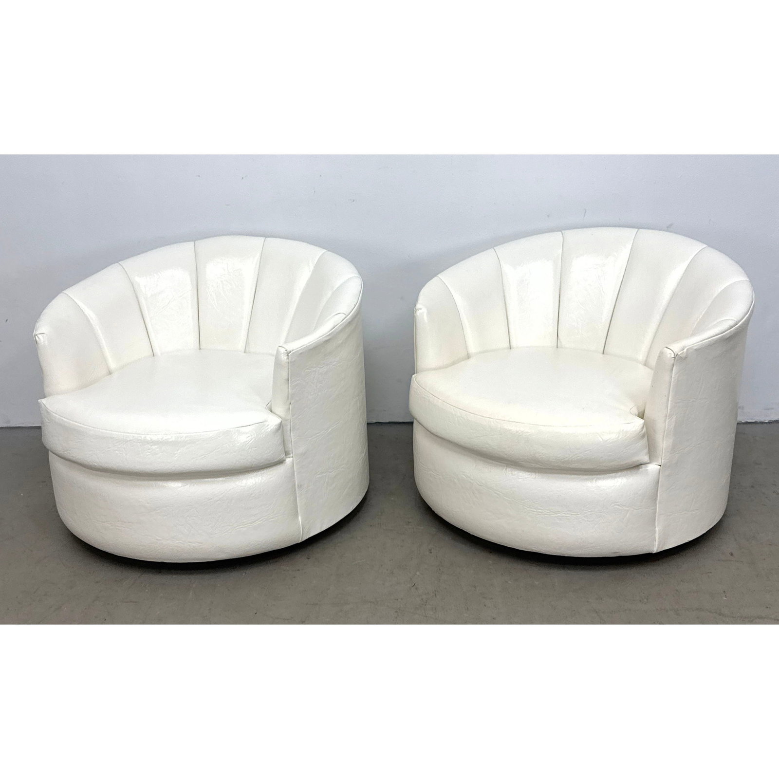 Pair of Mid-Century Modern Carter Chair Corp Club Chairs White Vinyl Swivel Channel Back Salisbury N: Pair of Mid-Century Modern Carter Chair Corp Club Chairs White Vinyl Swivel Channel Back Salisbury North Carolina Carter Chair Corp Swivel Barrel Chairs Dimensions: Height: 25 inches, Width: 31 inches