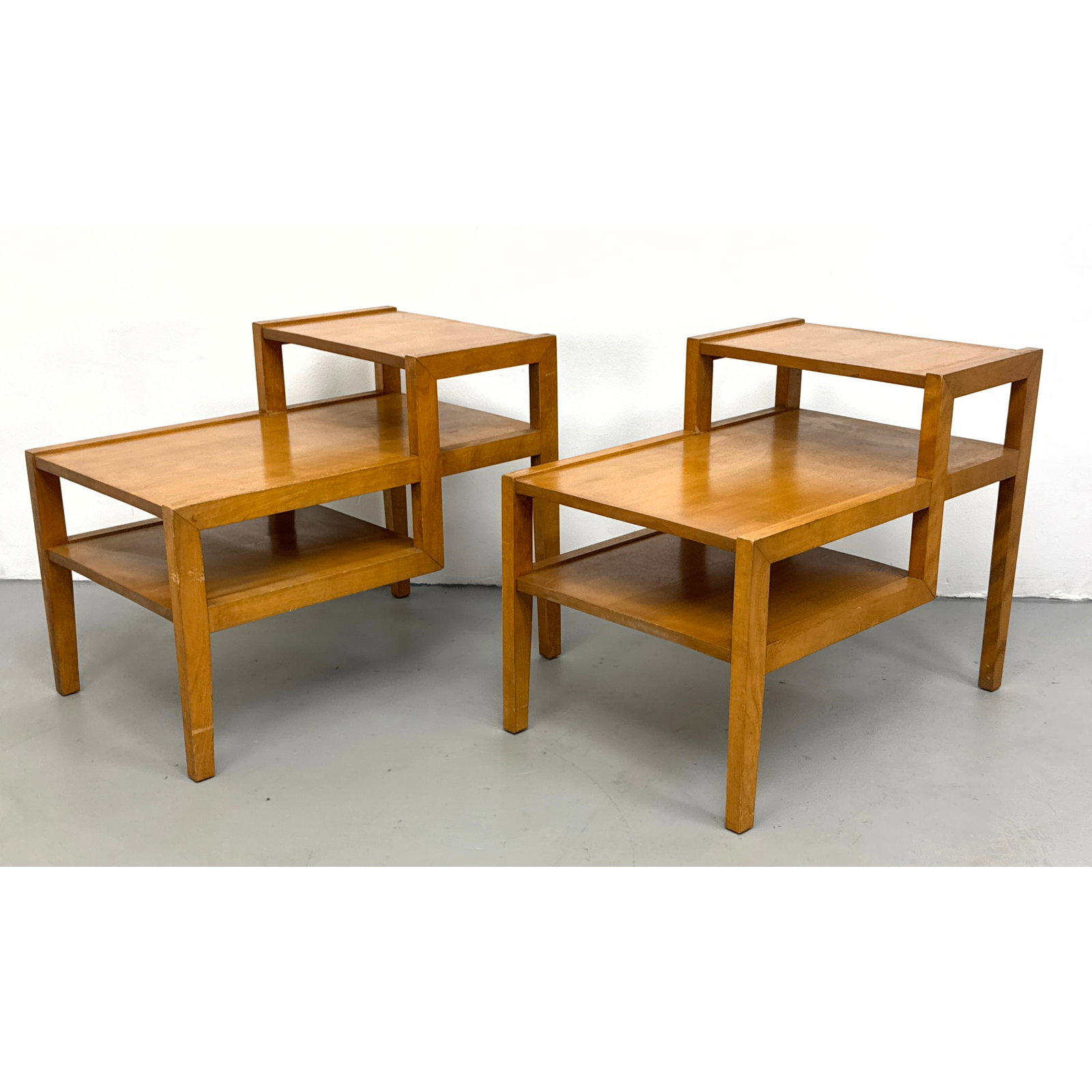 Pair of Leslie Diamond for Conant Ball Mid-Century Modern Step Side End Tables.: Pair of Leslie Diamond for Conant Ball Mid-Century Modern Step Side End Tables. Dimensions: Height: 23 inches, Width: 19.25 inches, Depth: 28.75 inches. ---