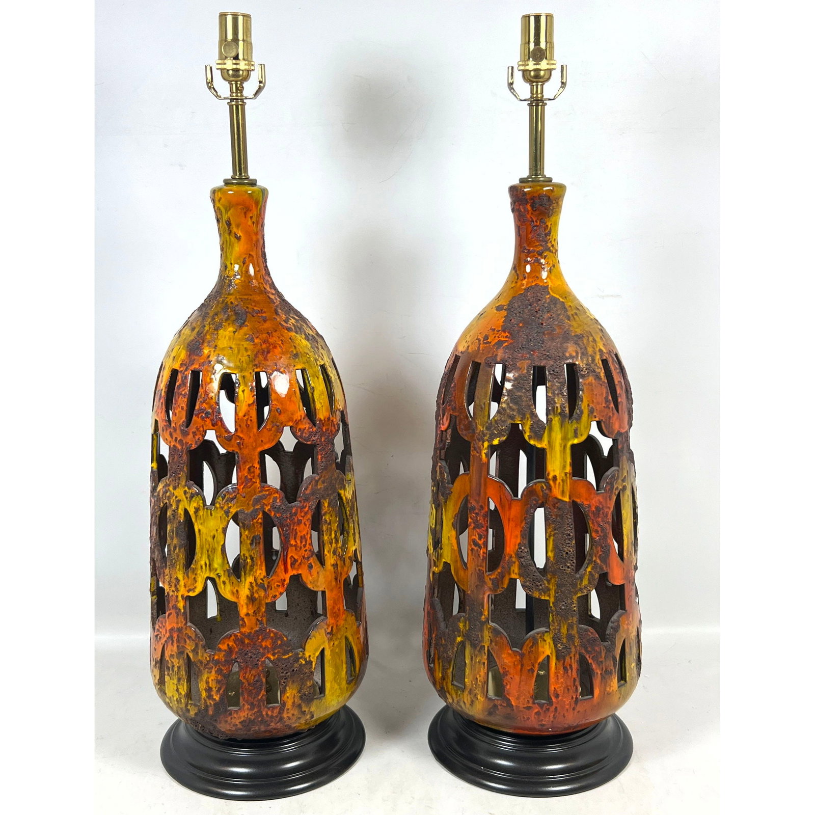 Pair of large Mid Century Modern Brutalist reticulated ceramic table lamps with vibrant orange and y (1 of 11)