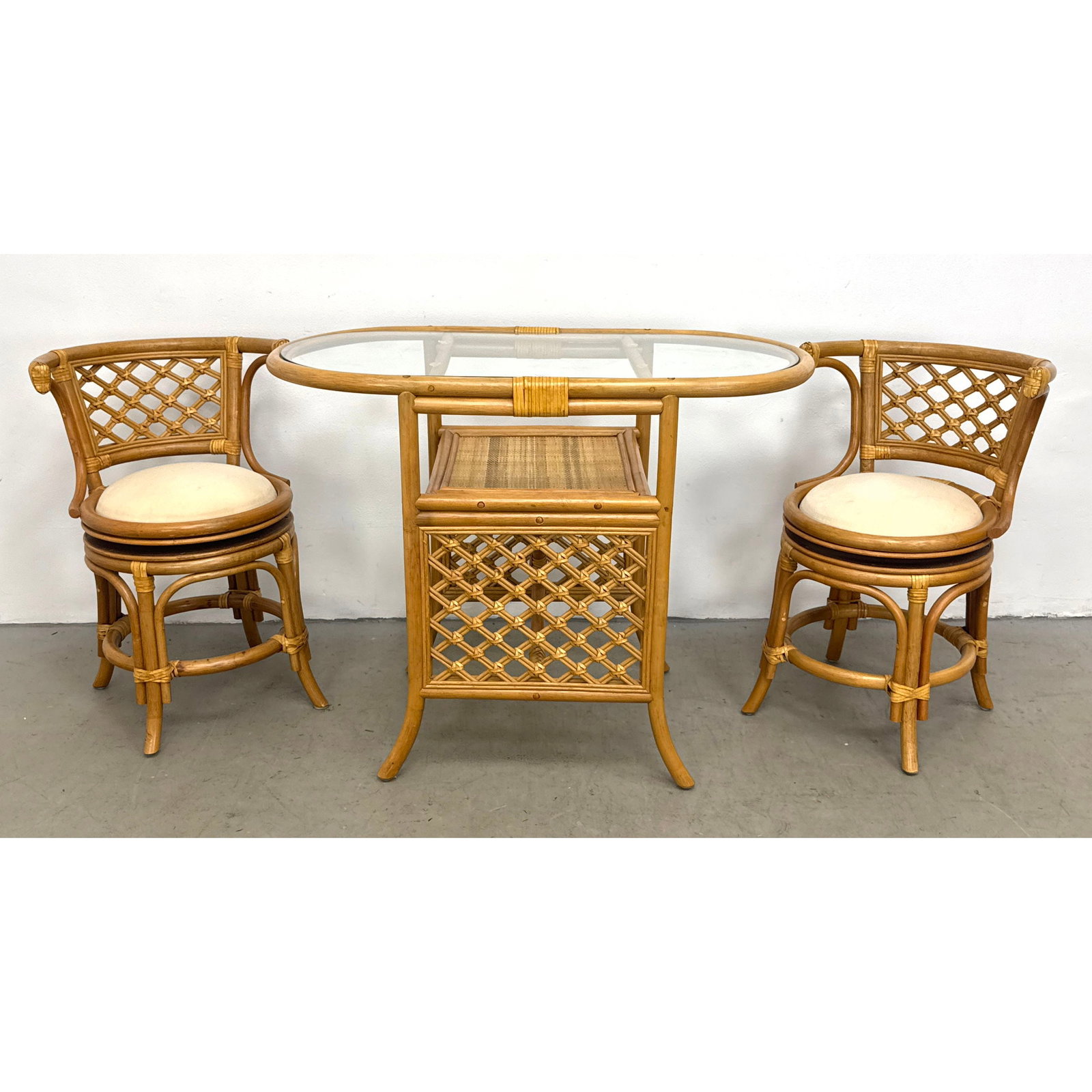 3pc Rattan and Cane Bistro Set with Oval Glass Top Table and 2 chairs: 3pc Rattan and Cane Bistro Set with Oval Glass Top Table and 2 chairs Dimensions: Height: 29 inches, Width: 38.5 inches, Depth: 20 inches. - Seat Height: 19 inches ---